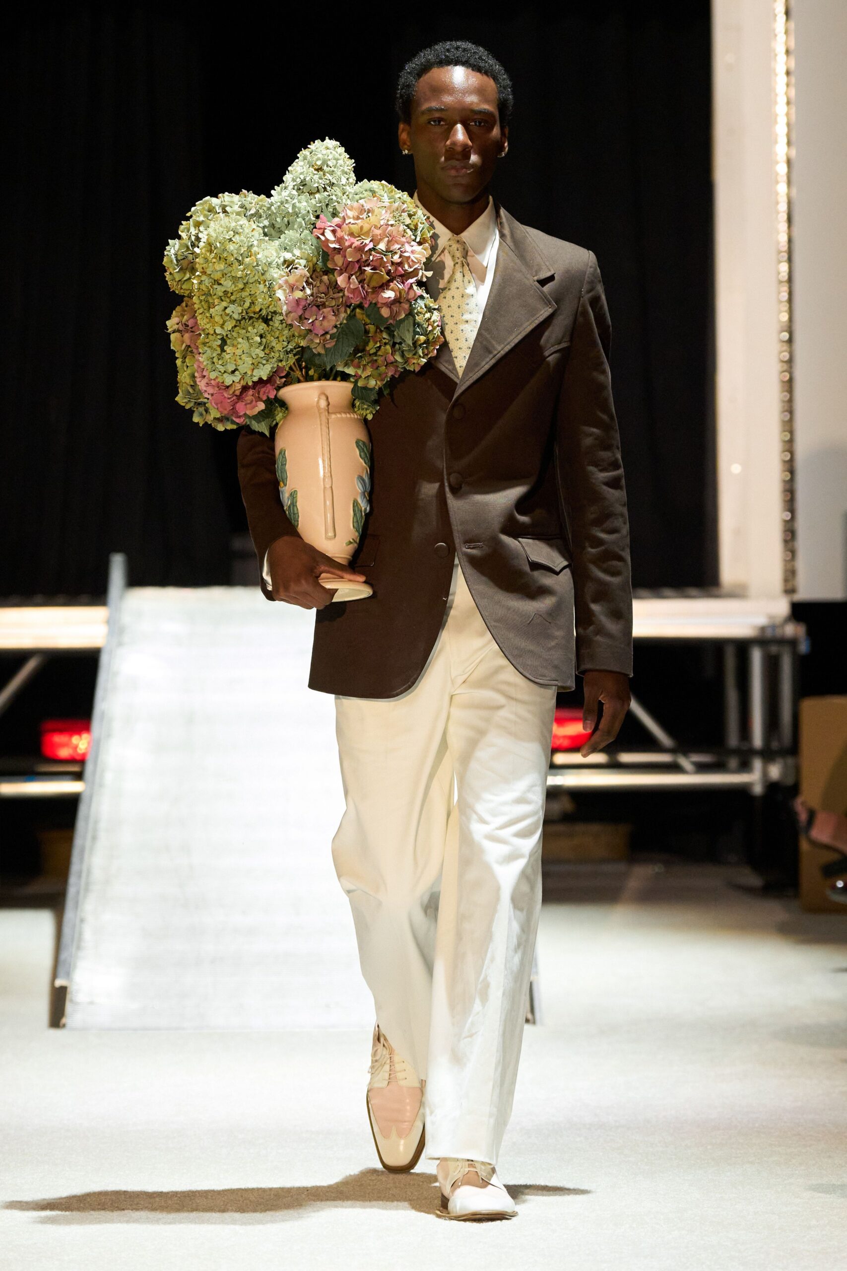 brown tailored blazer white pants