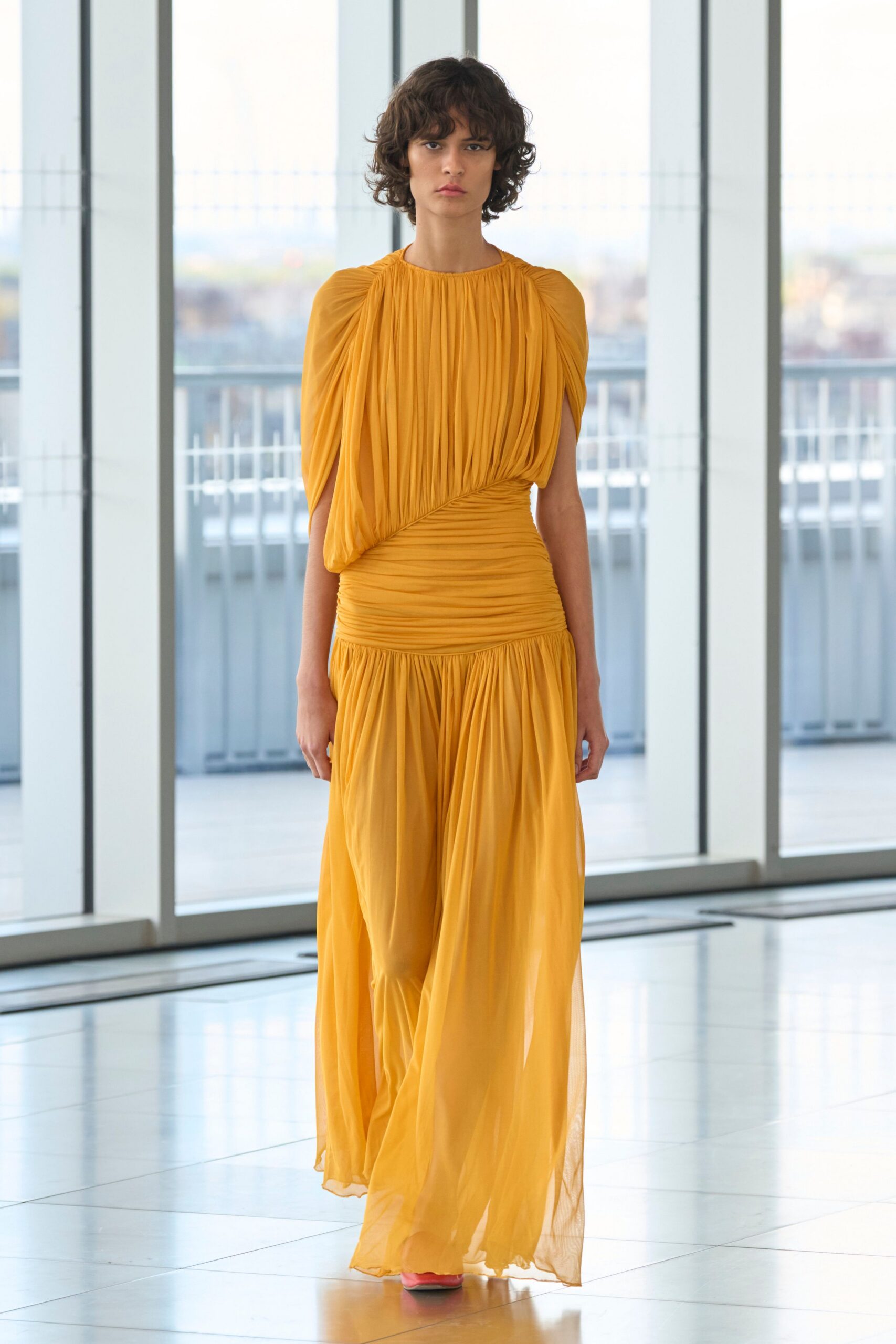 yellow chiffon sleeveless high-neck fitted pleated draped gown