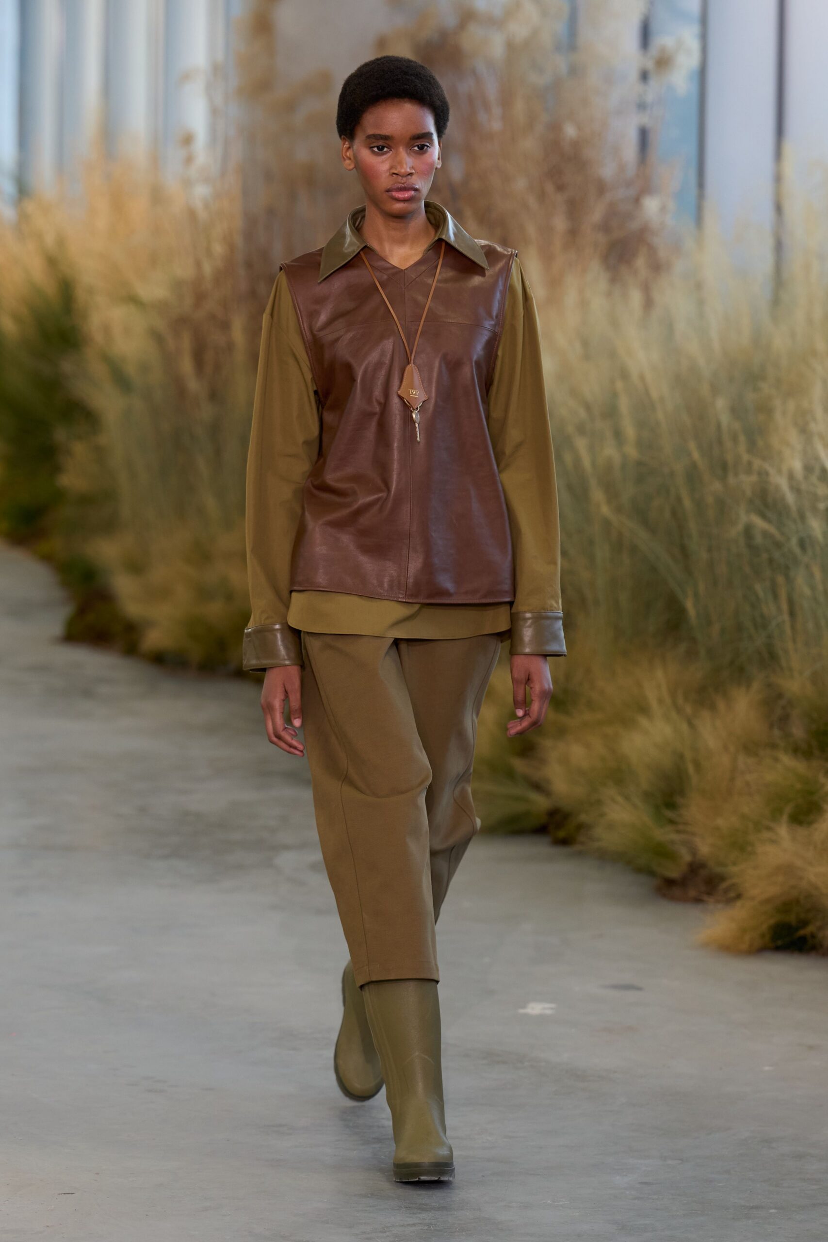 brown leather shirt green pants