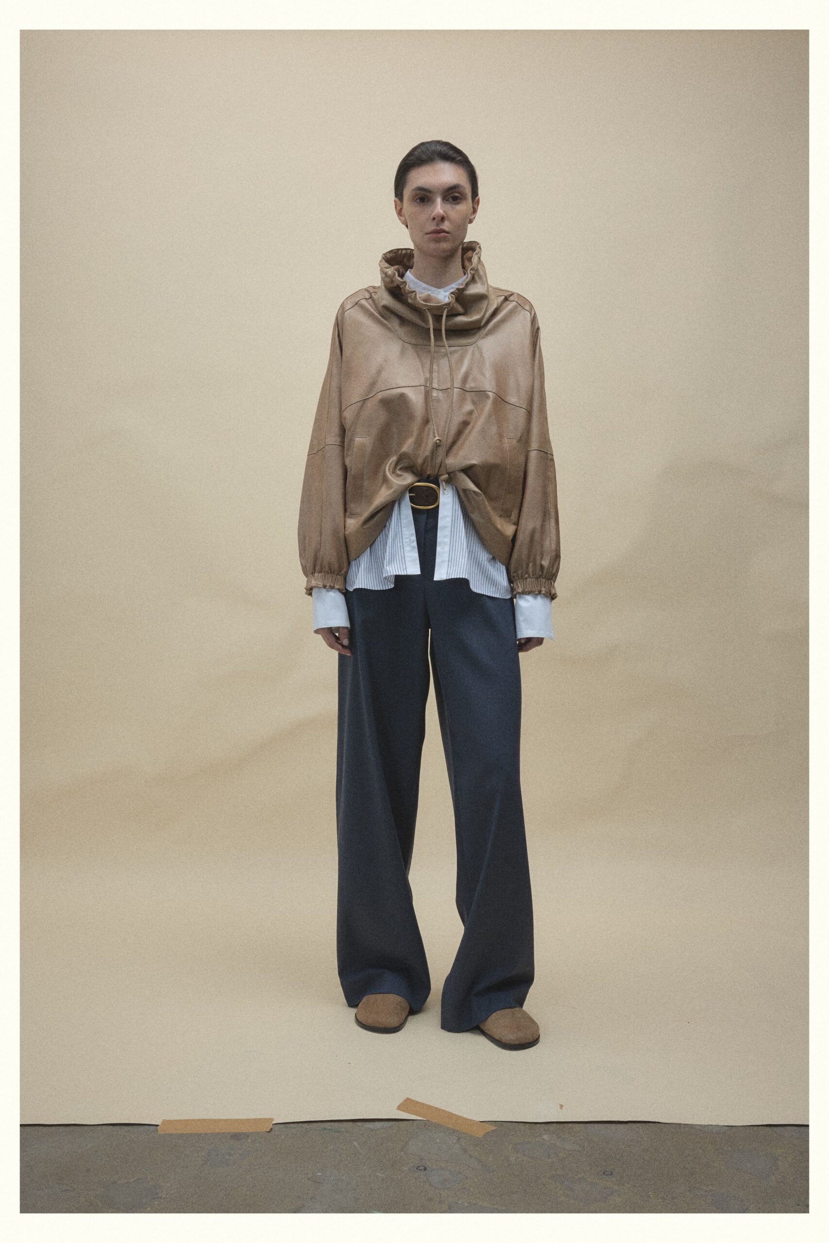 gold silk hoodie with gray pants