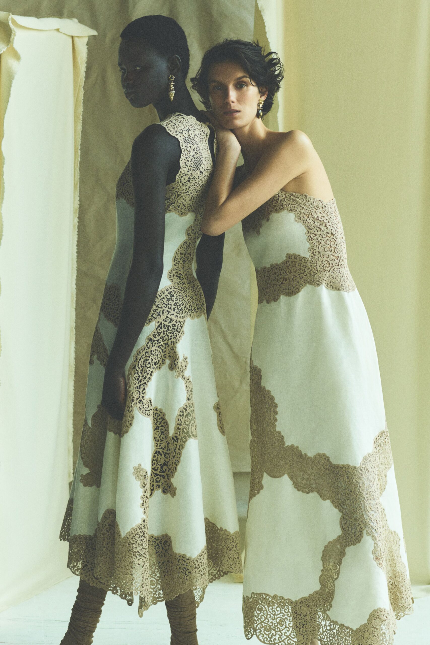ivory silk sleeveless off-shoulder fitted embroidered flared gown