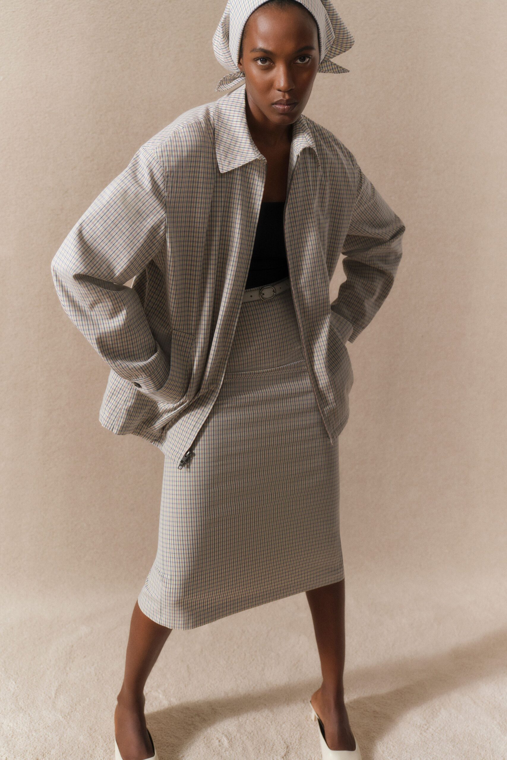 beige cotton fitted checked skirt
