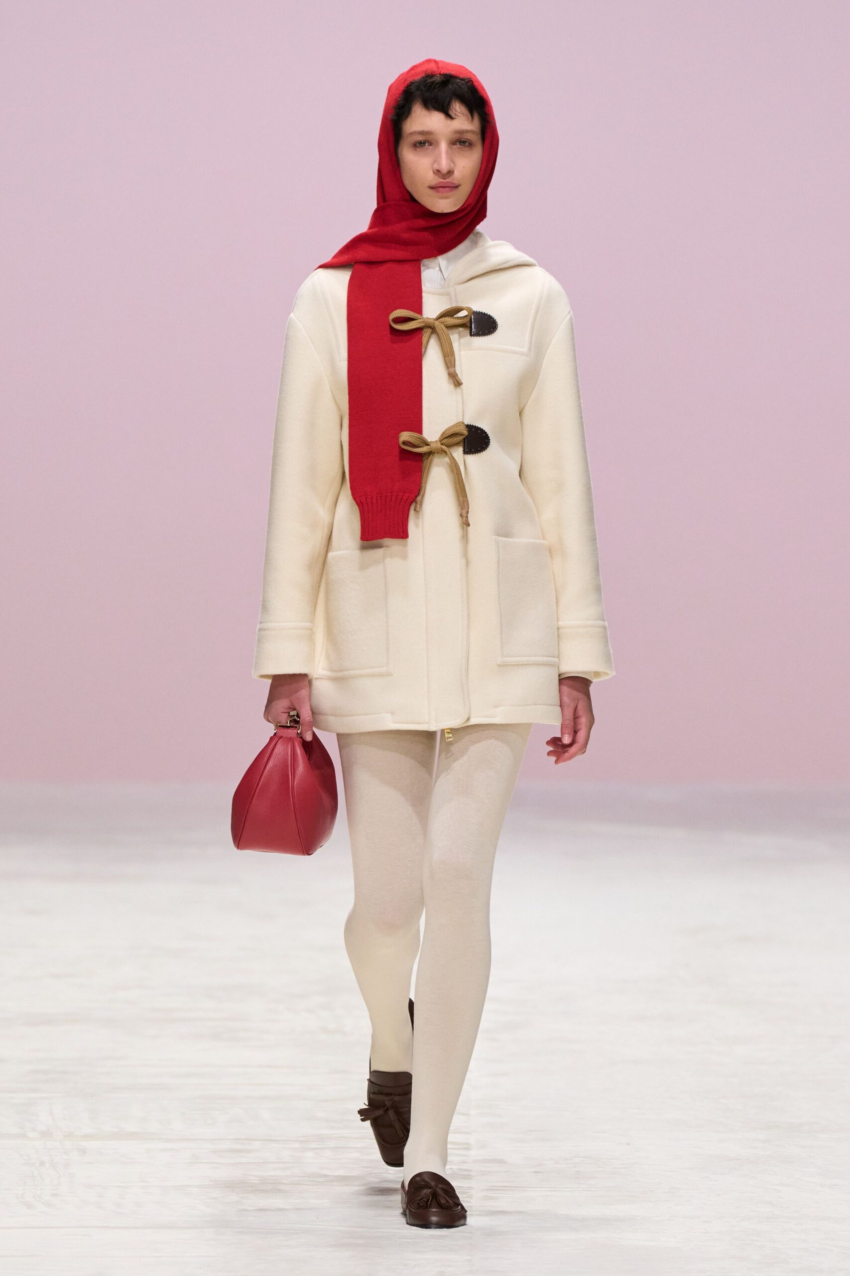 white wool coat with red scarf