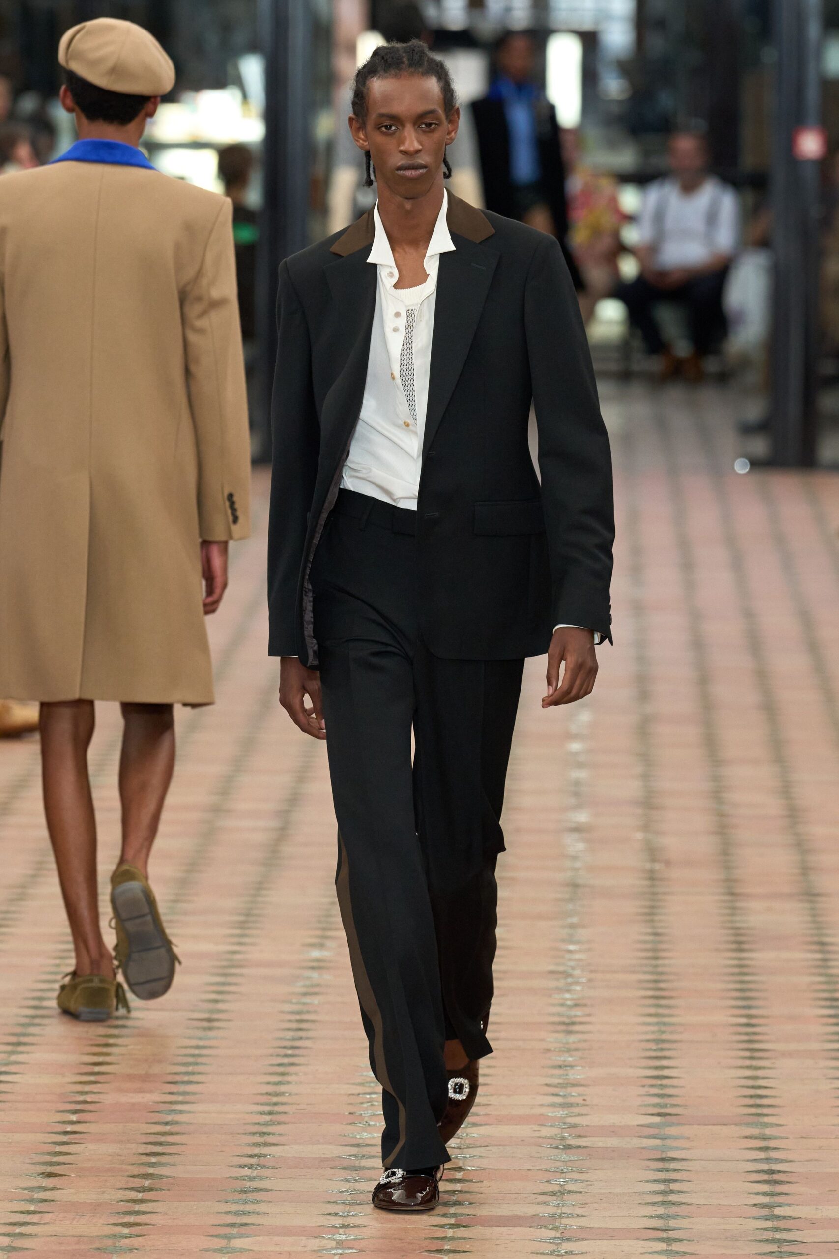 black tailored suit with white shirt
