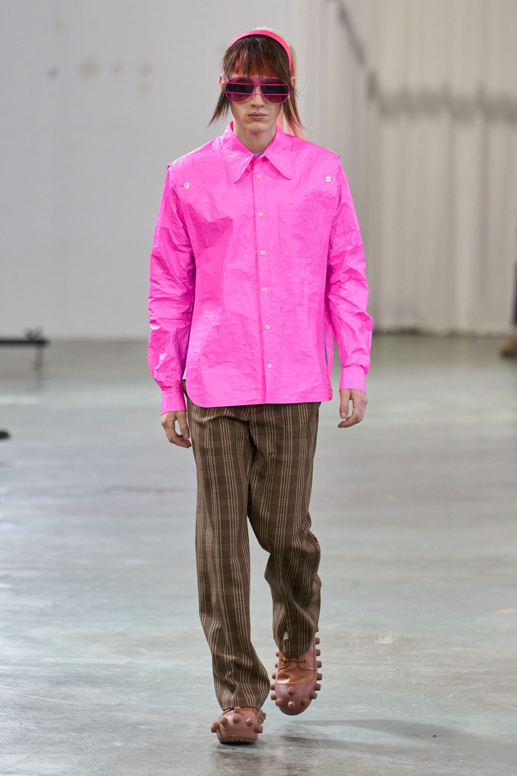 pink shirt brown pants