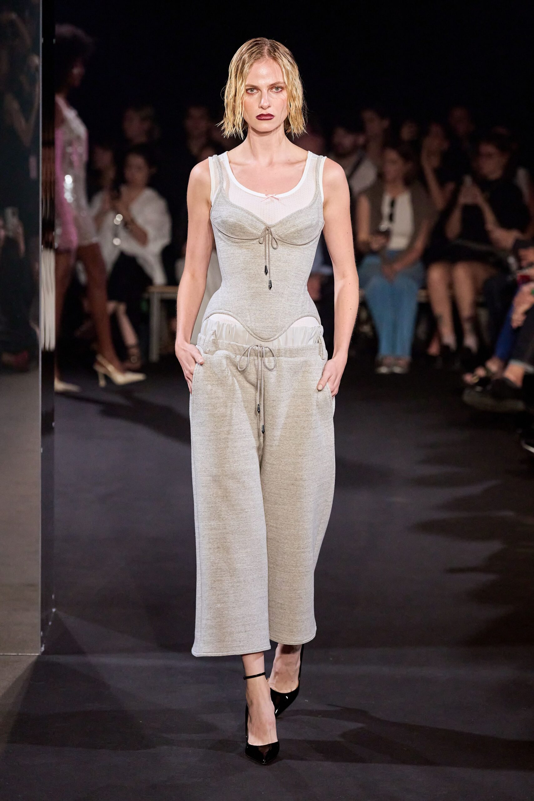 gray relaxed jumpsuit with black shoes