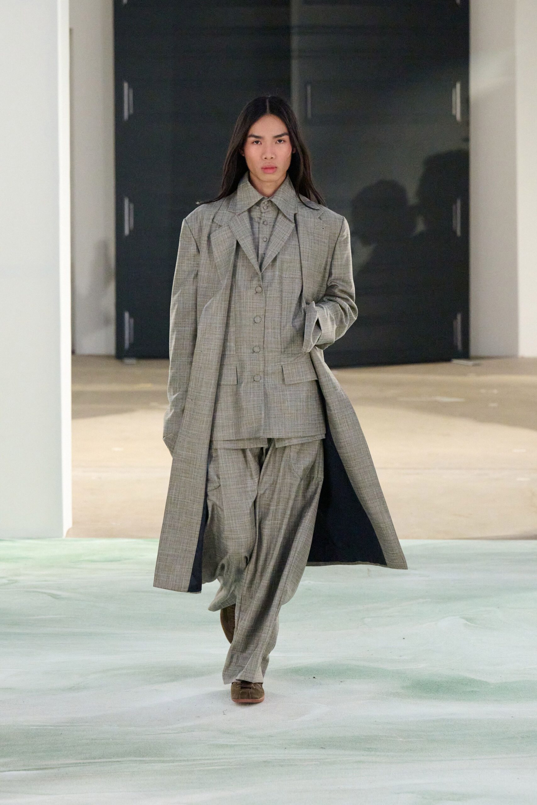 gray tailored suit with brown shoes