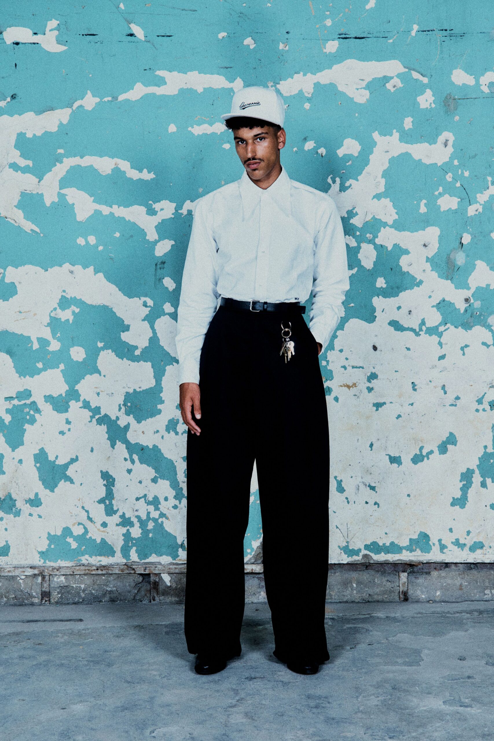 white shirt black wide-leg pants