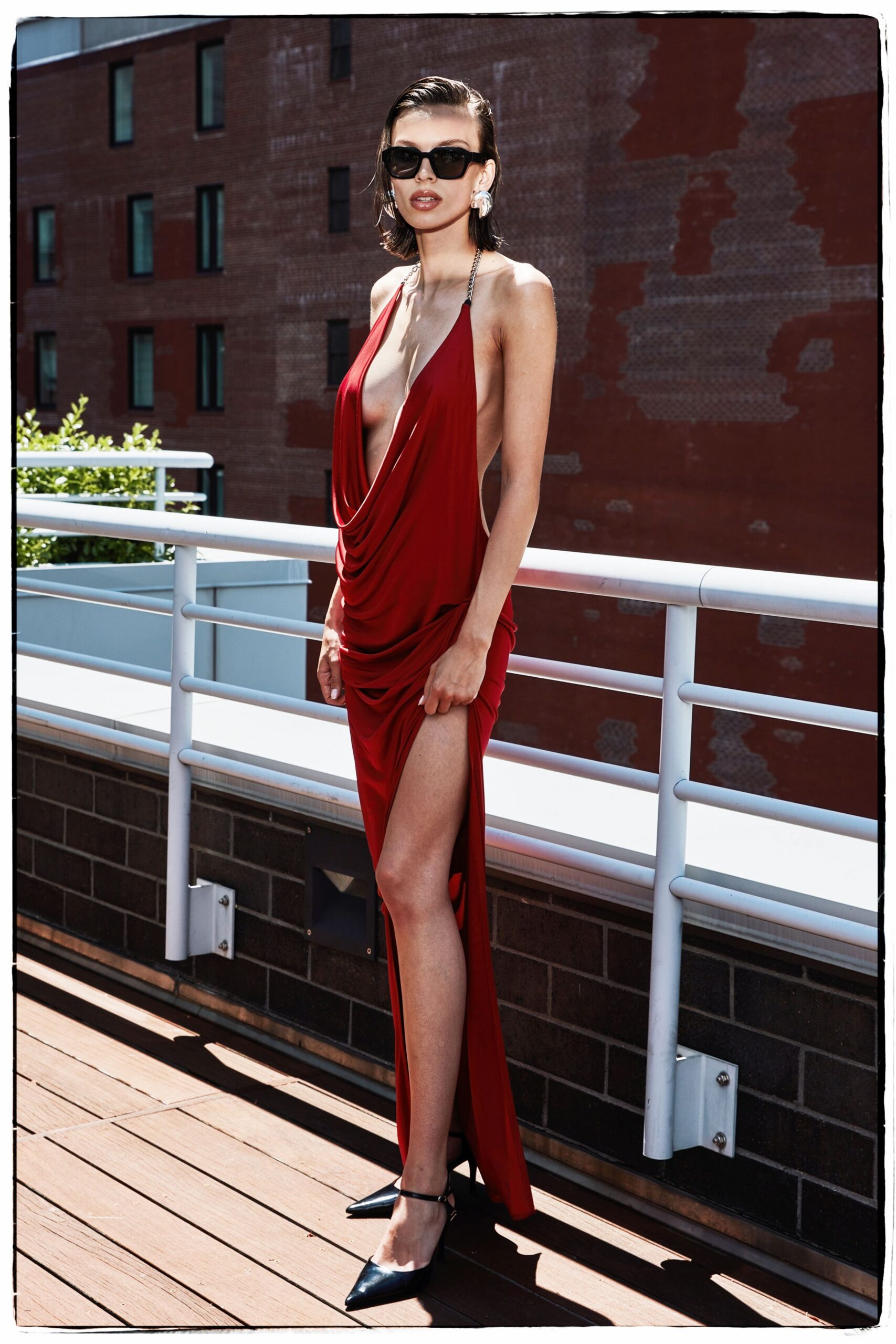red silk sleeveless v-neck fitted draped maxi gown
