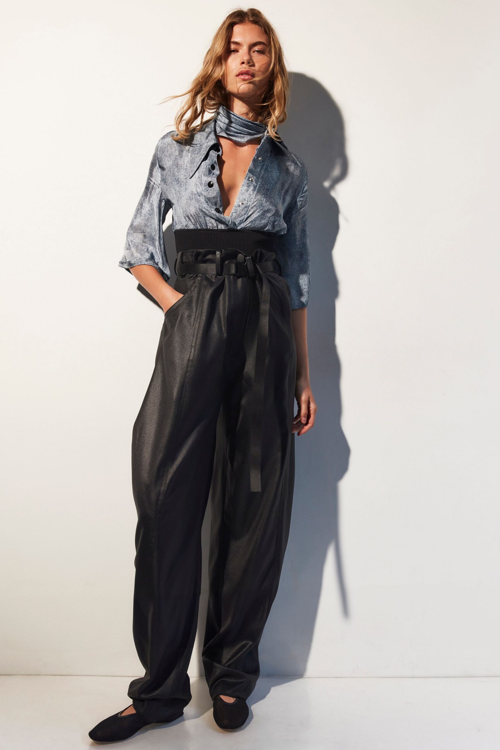 black leather fitted wide-leg pants