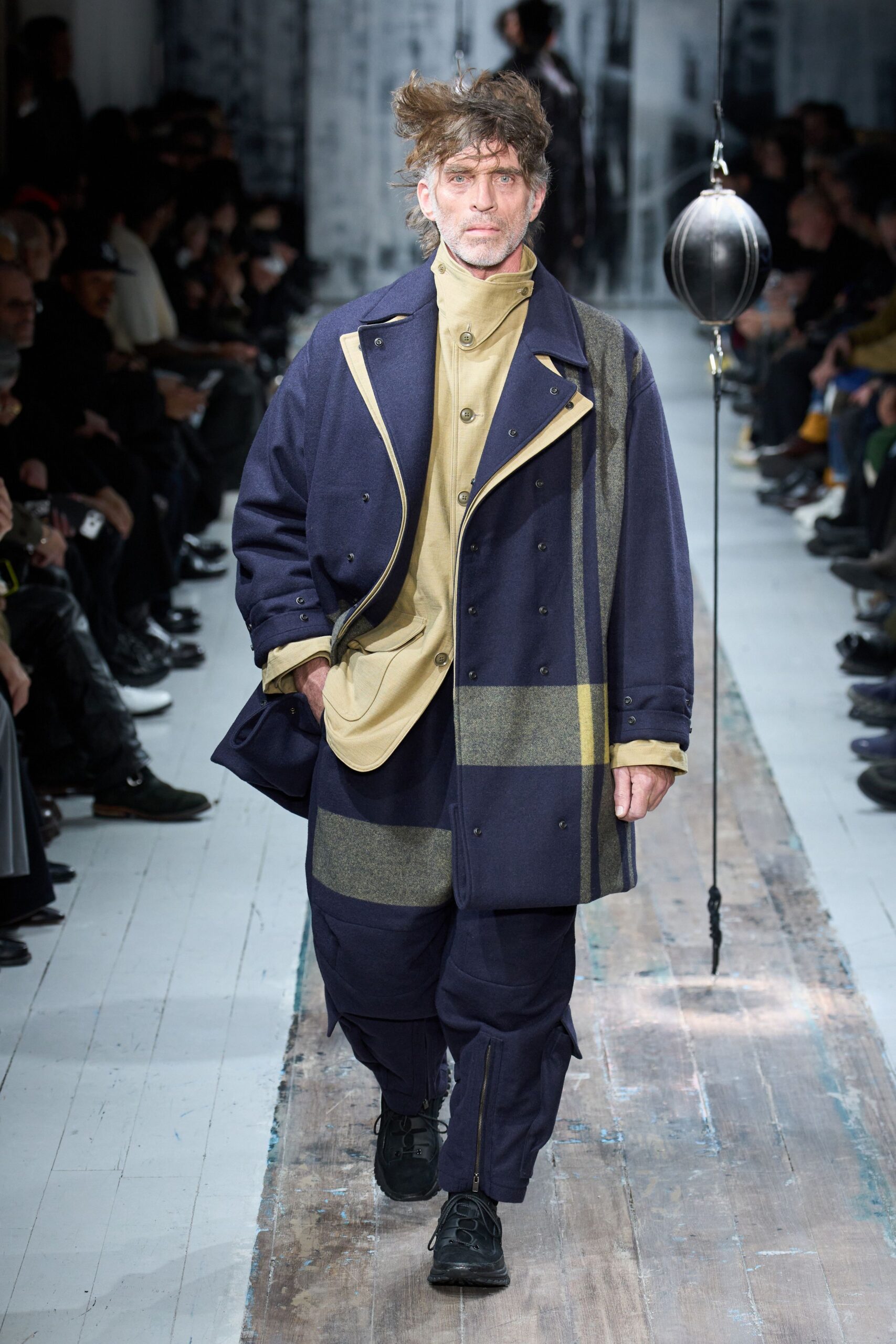 blue relaxed coat beige shirt