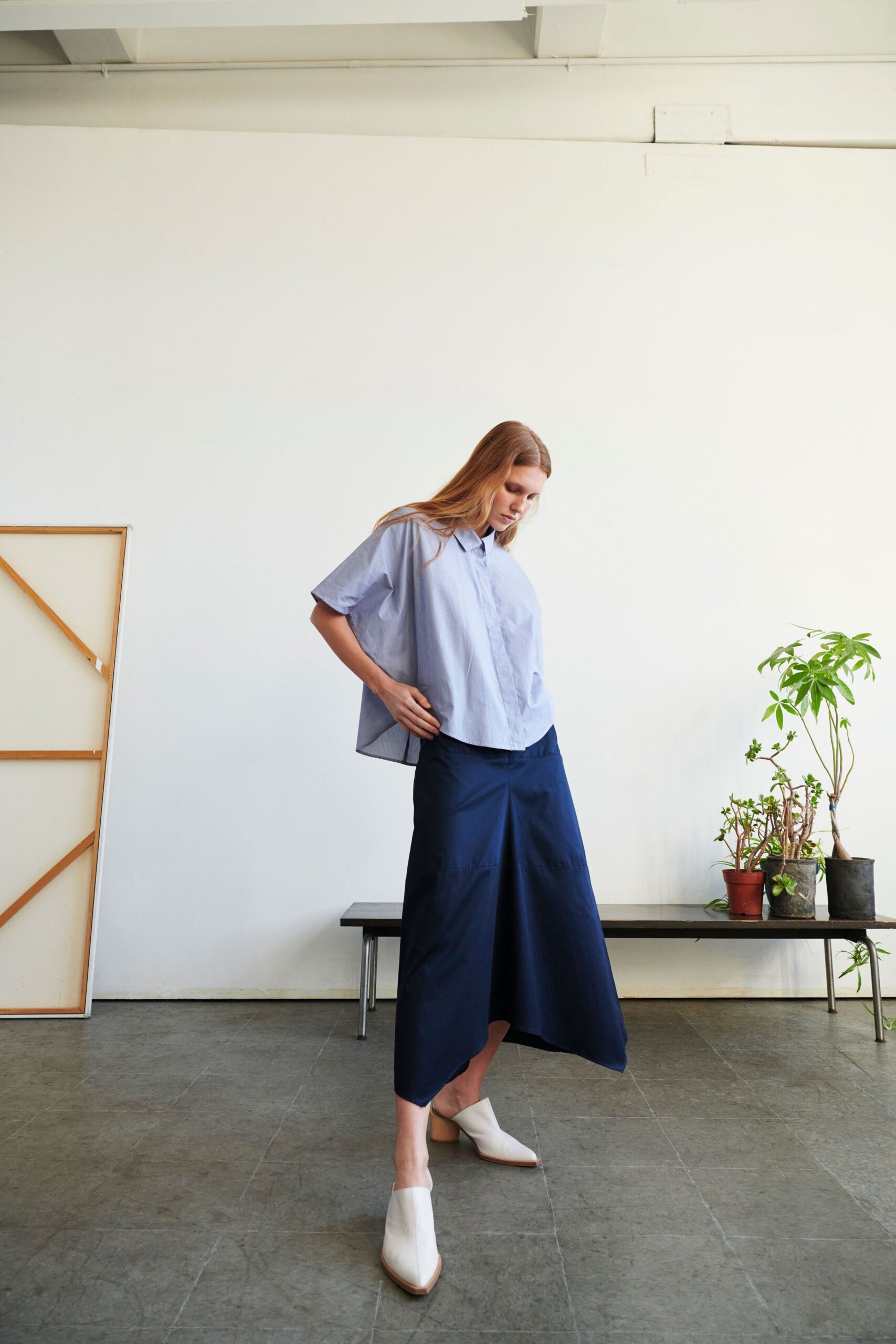 blue relaxed shirt with navy skirt