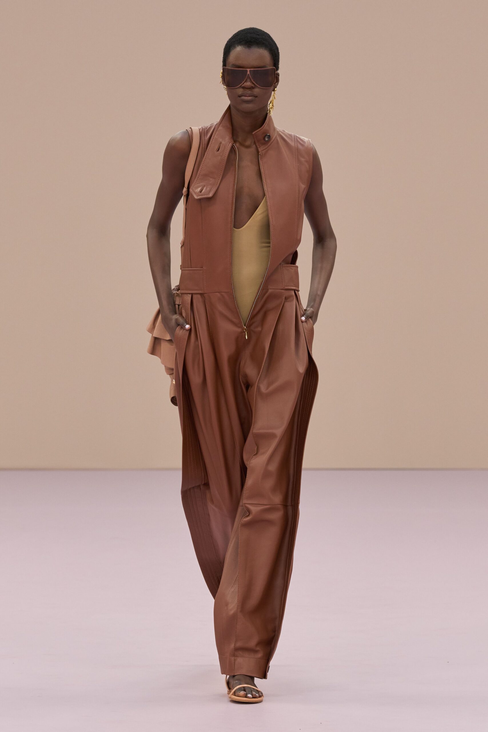 brown leather sleeveless collared relaxed zippered pleated jumpsuit