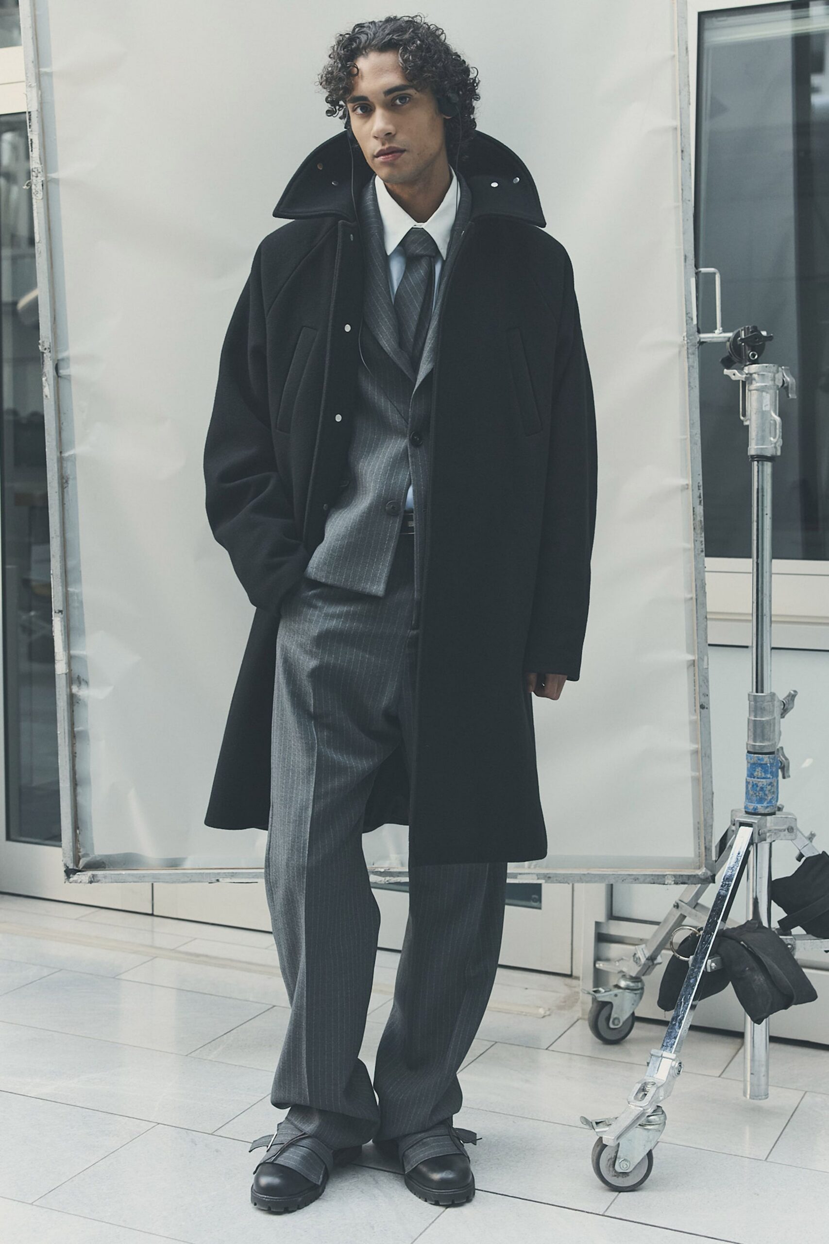 black wool coat gray suit