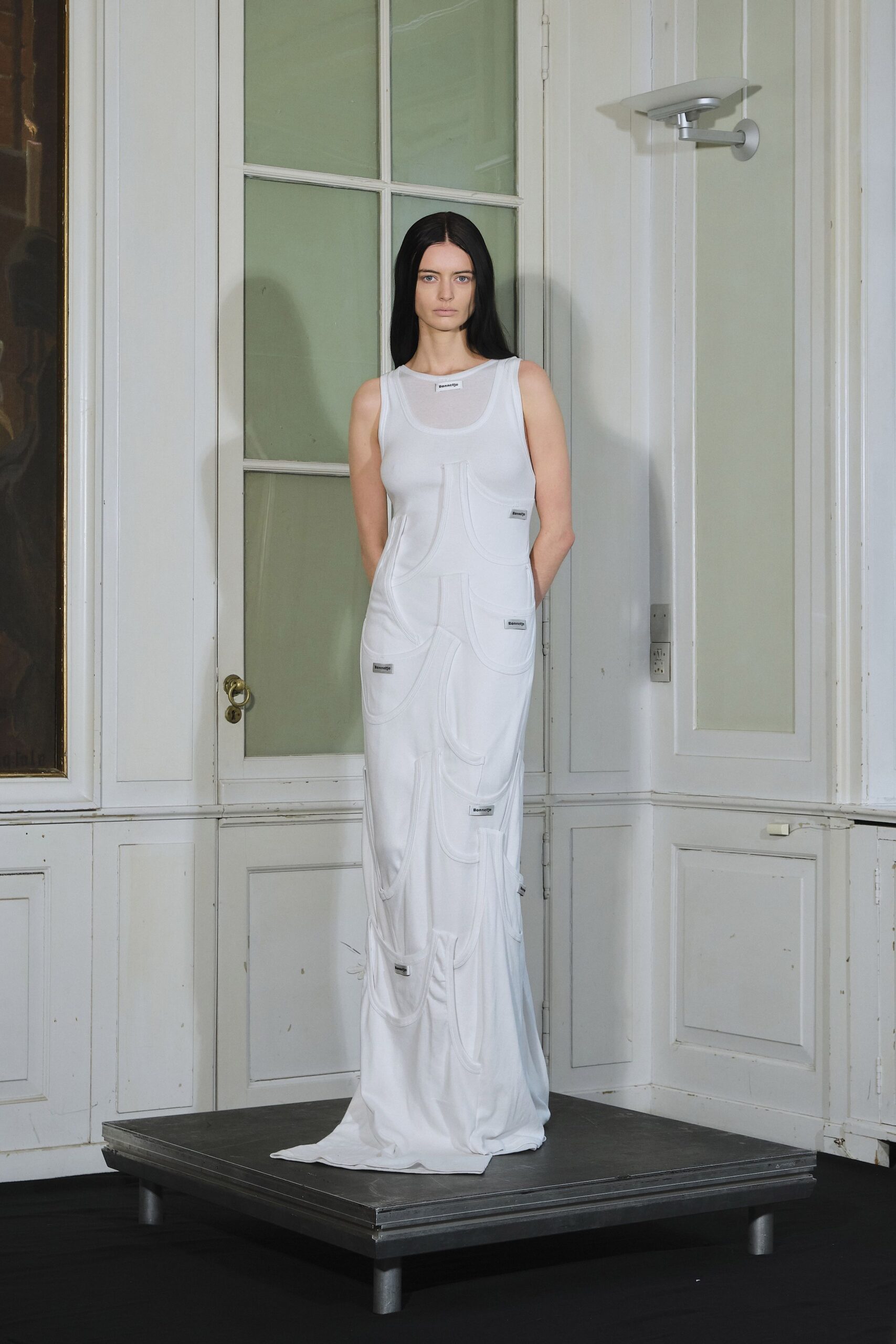 fitted white sleeveless gown