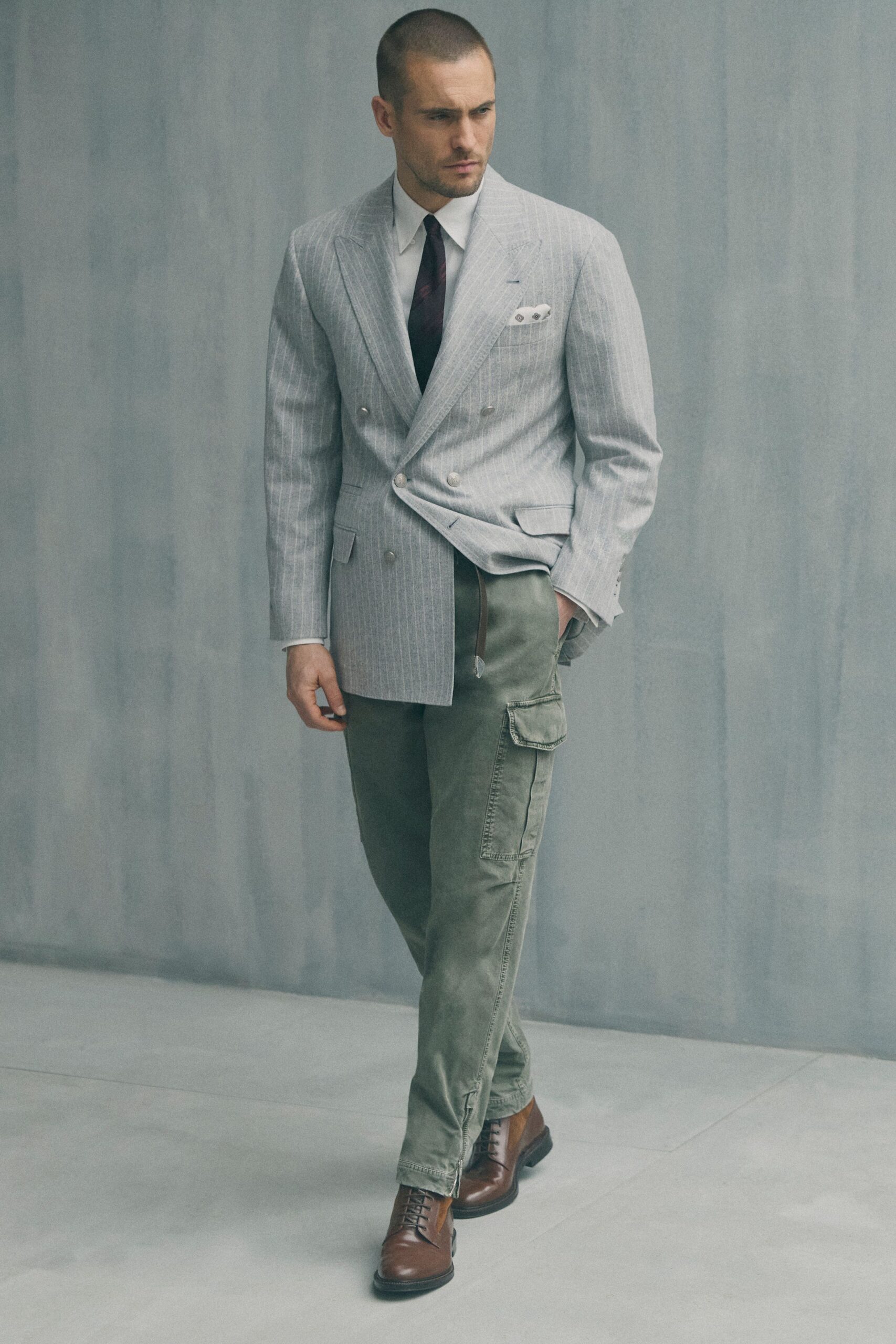 gray striped blazer with cargo pants