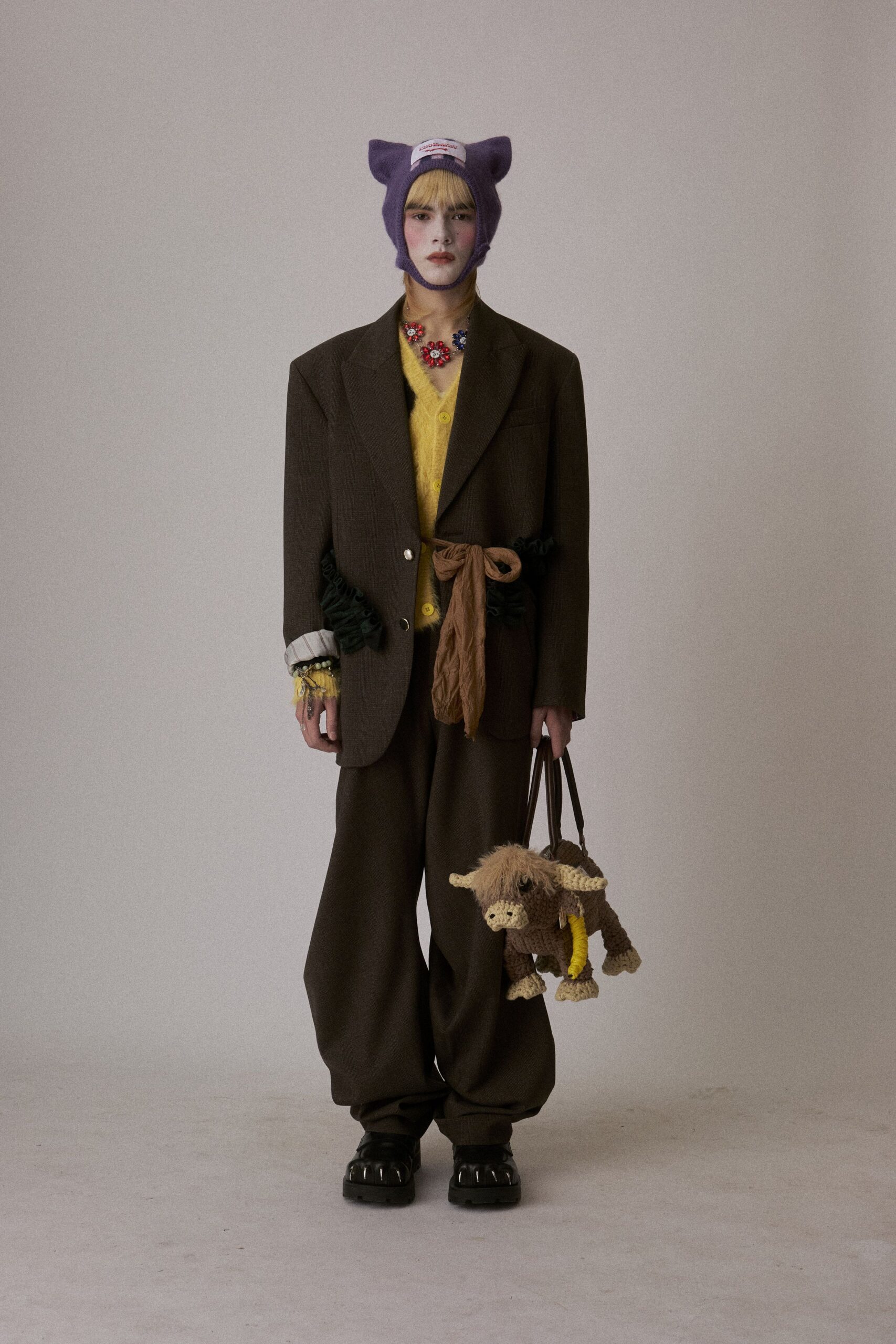 brown blazer with yellow top