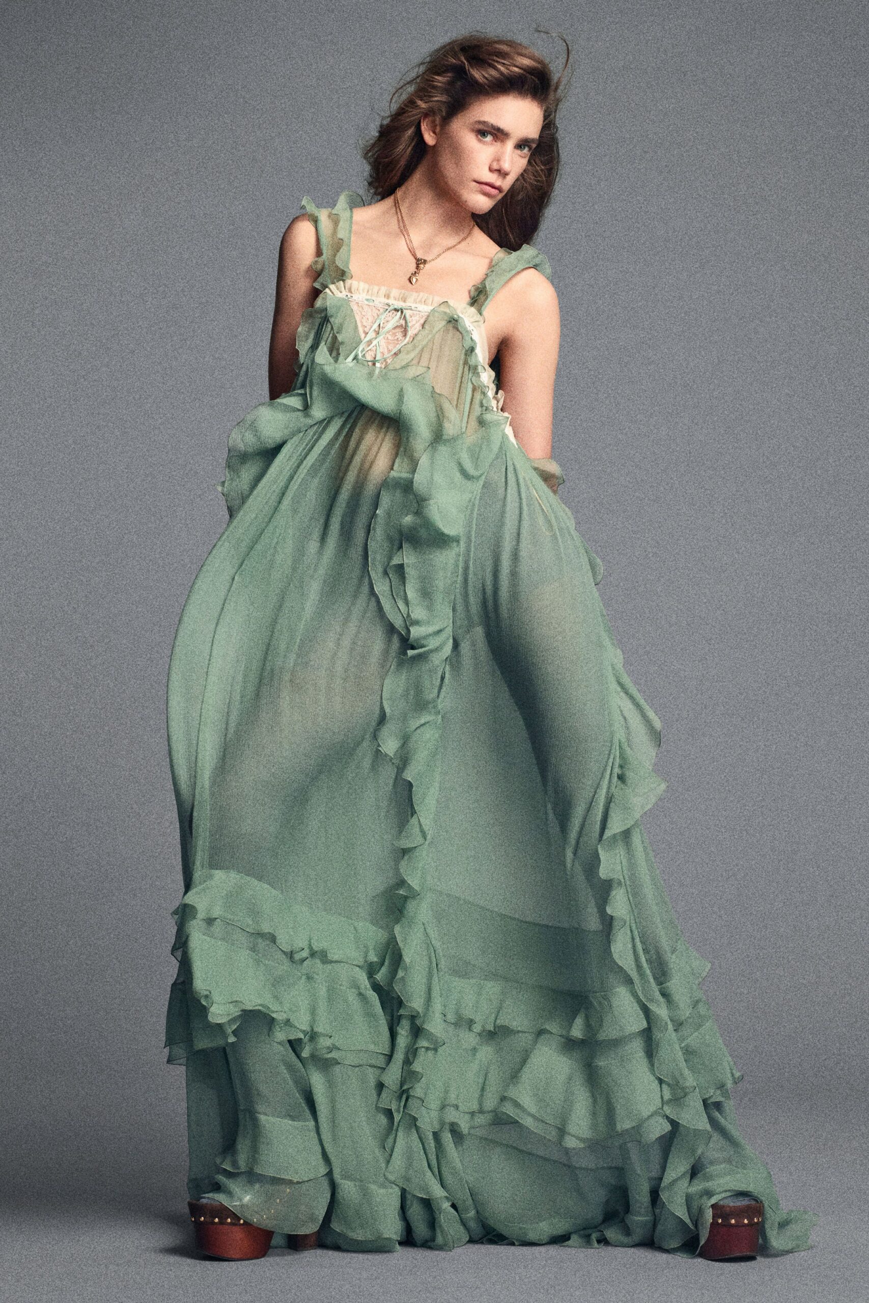 green chiffon sleeveless gown