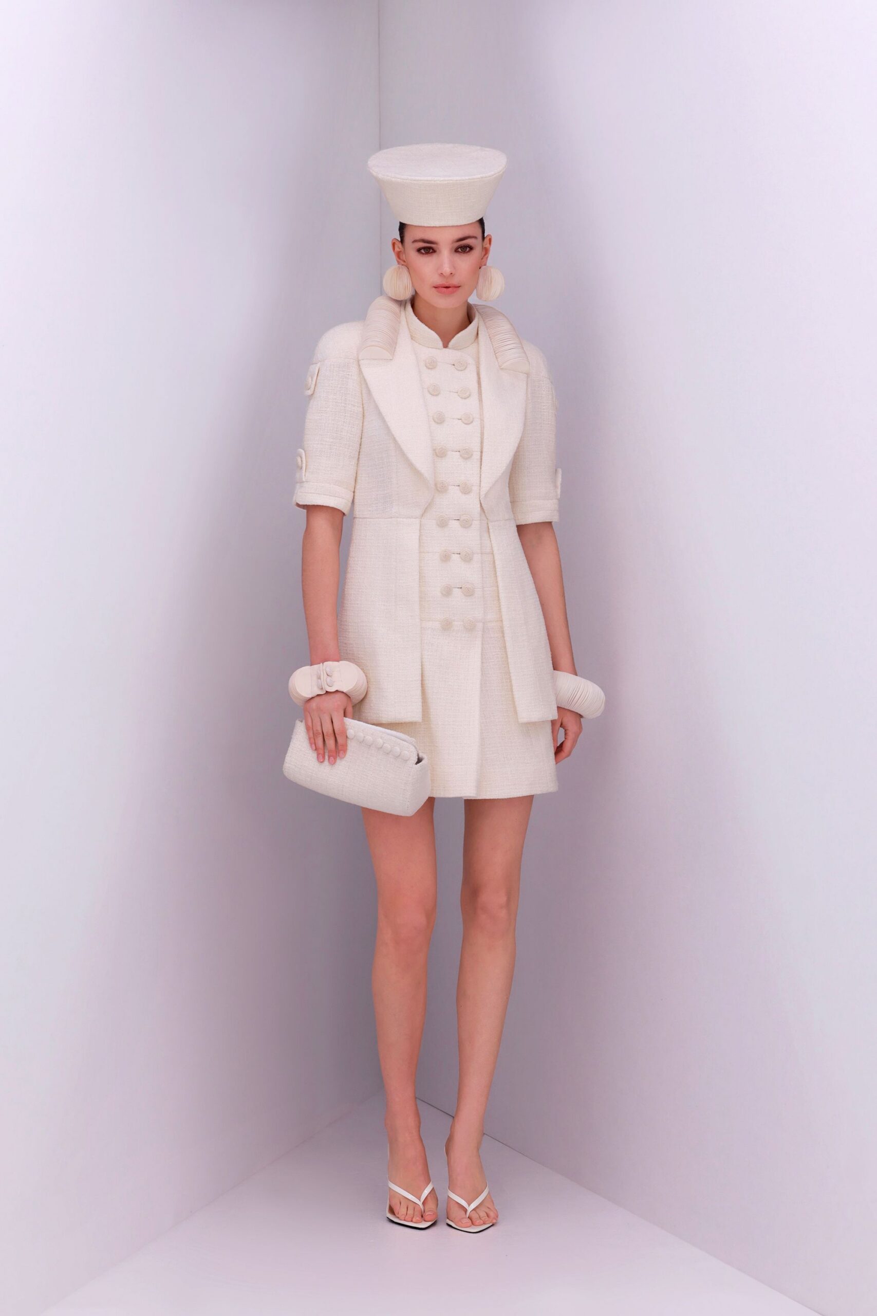 white cotton short-sleeve collared structured buttoned short jacket