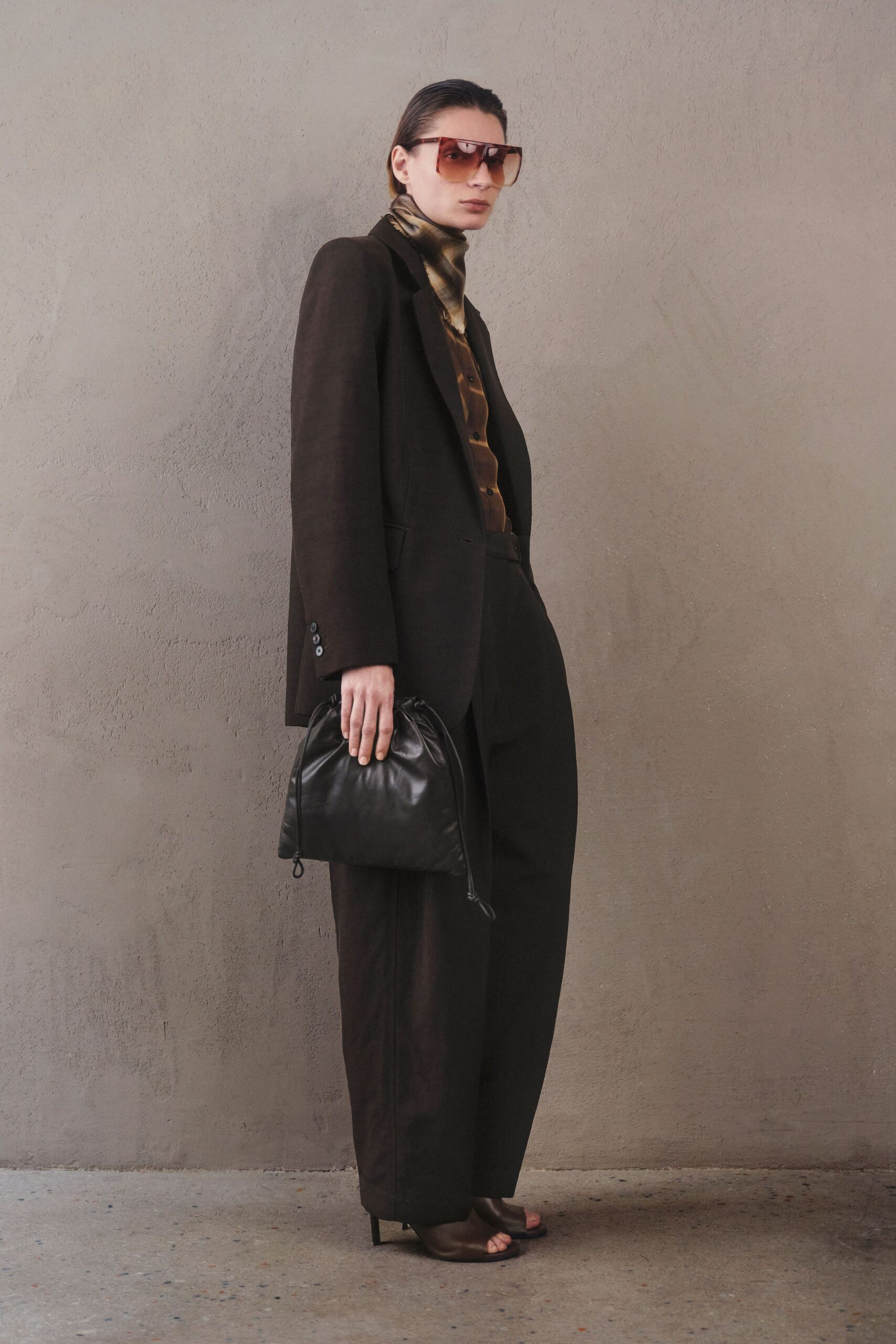 brown tailored blazer with silk shirt