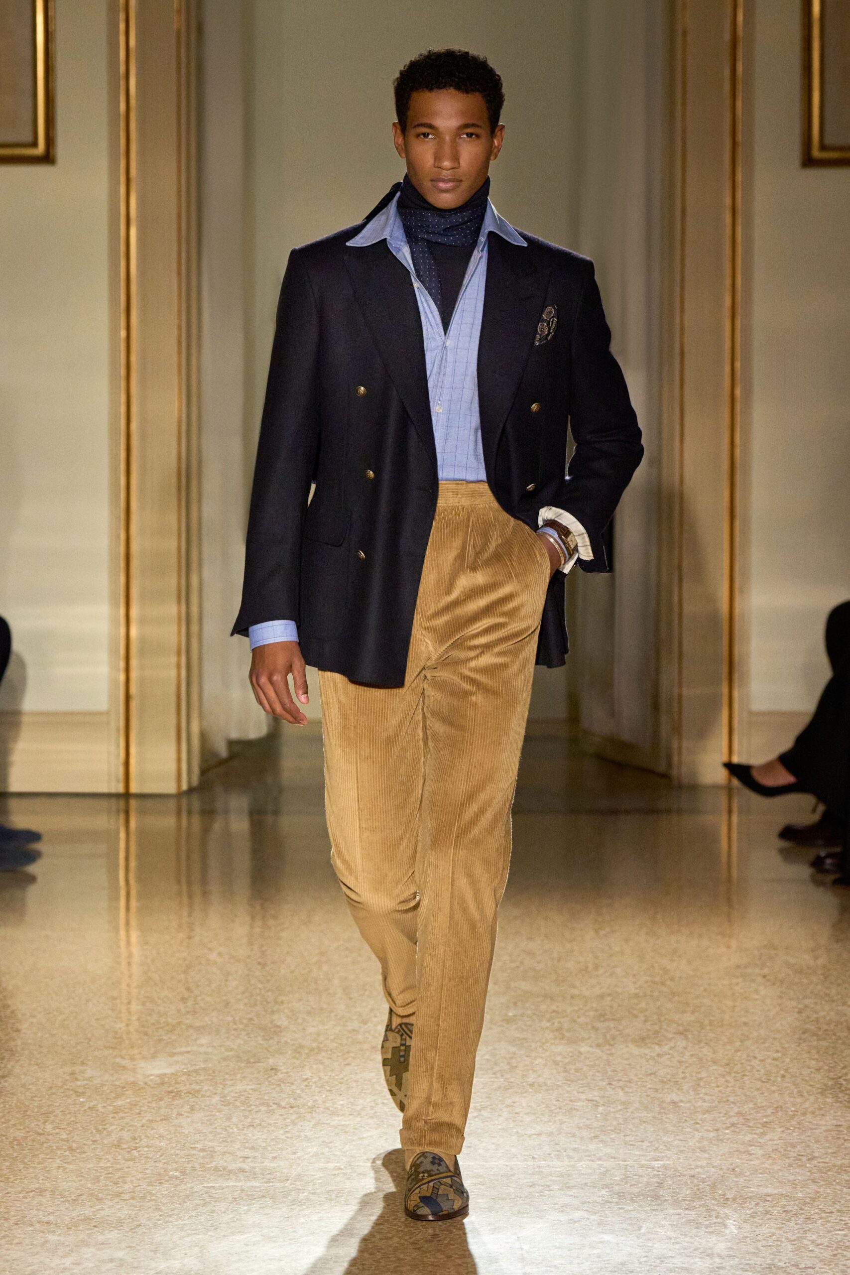 black blazer blue shirt beige pants