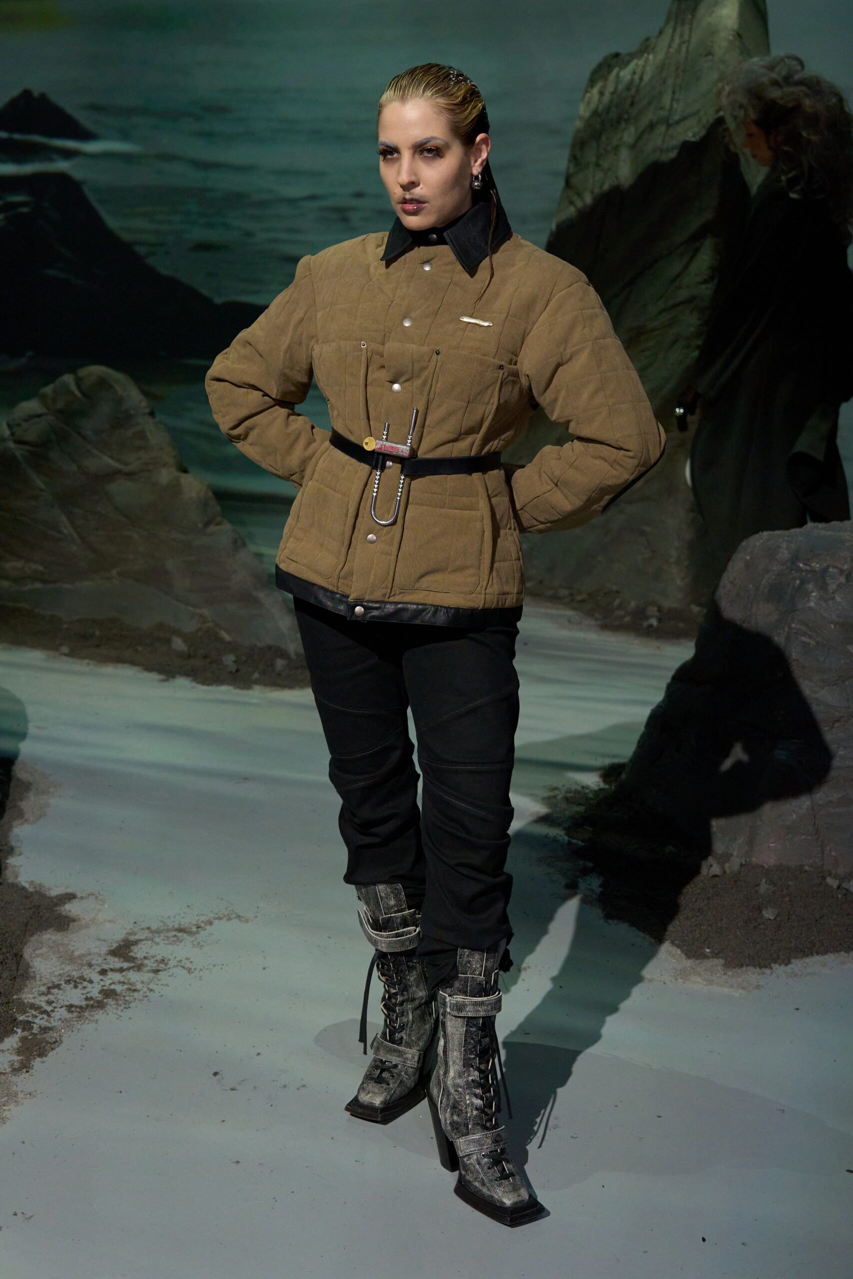 brown fitted jacket with black pants