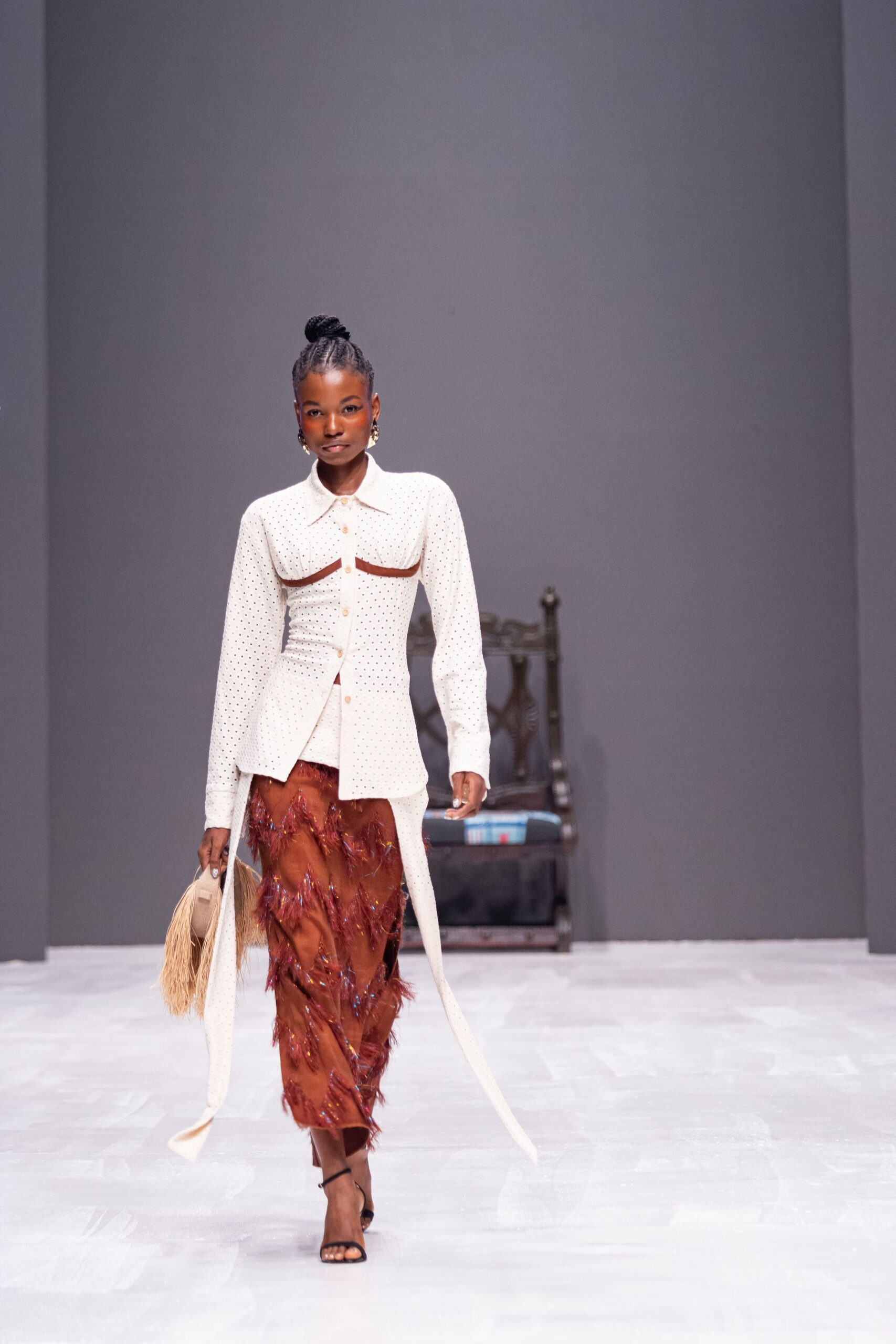 white fitted shirt brown pleated skirt