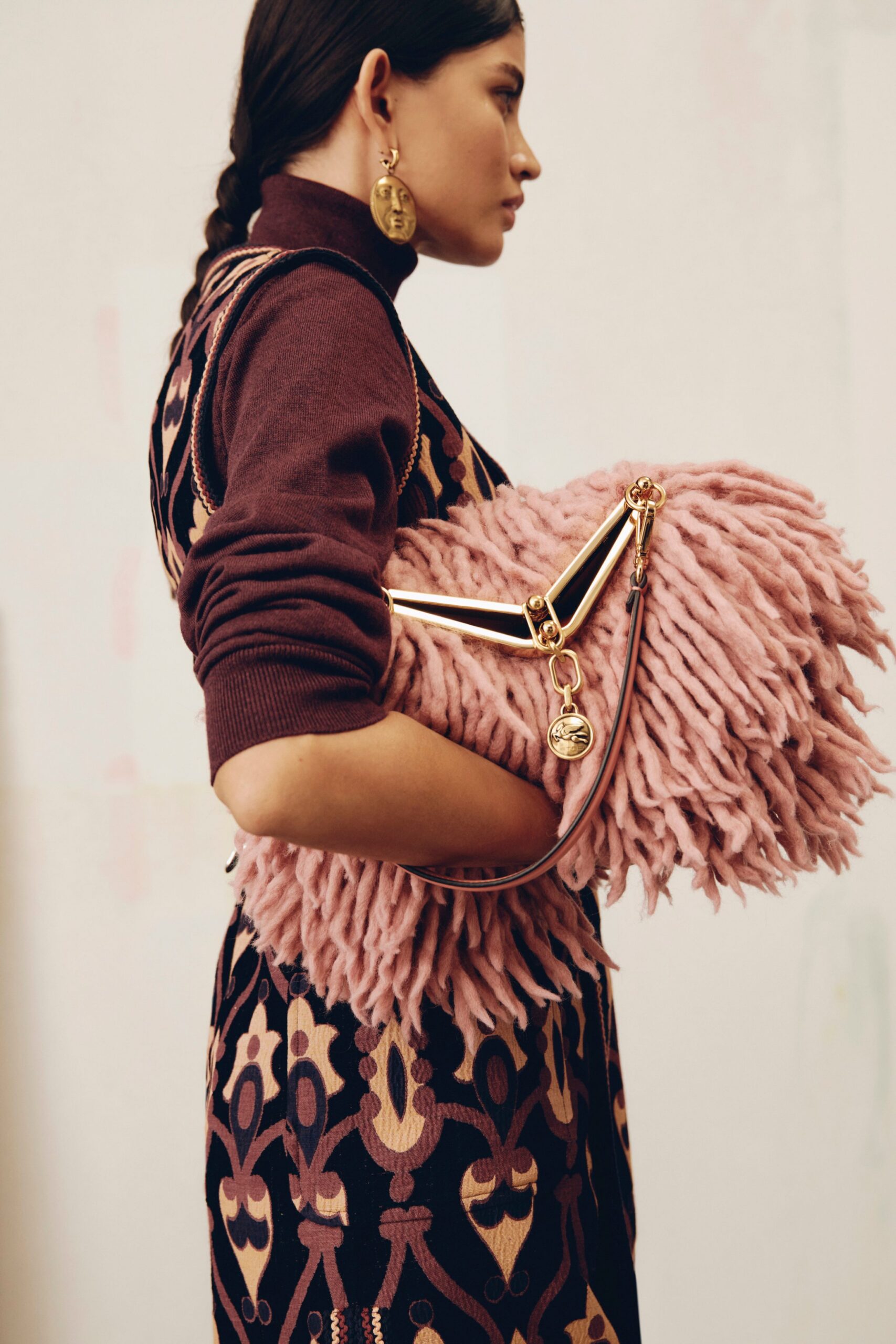 purple embroidered midi dress with pink bag