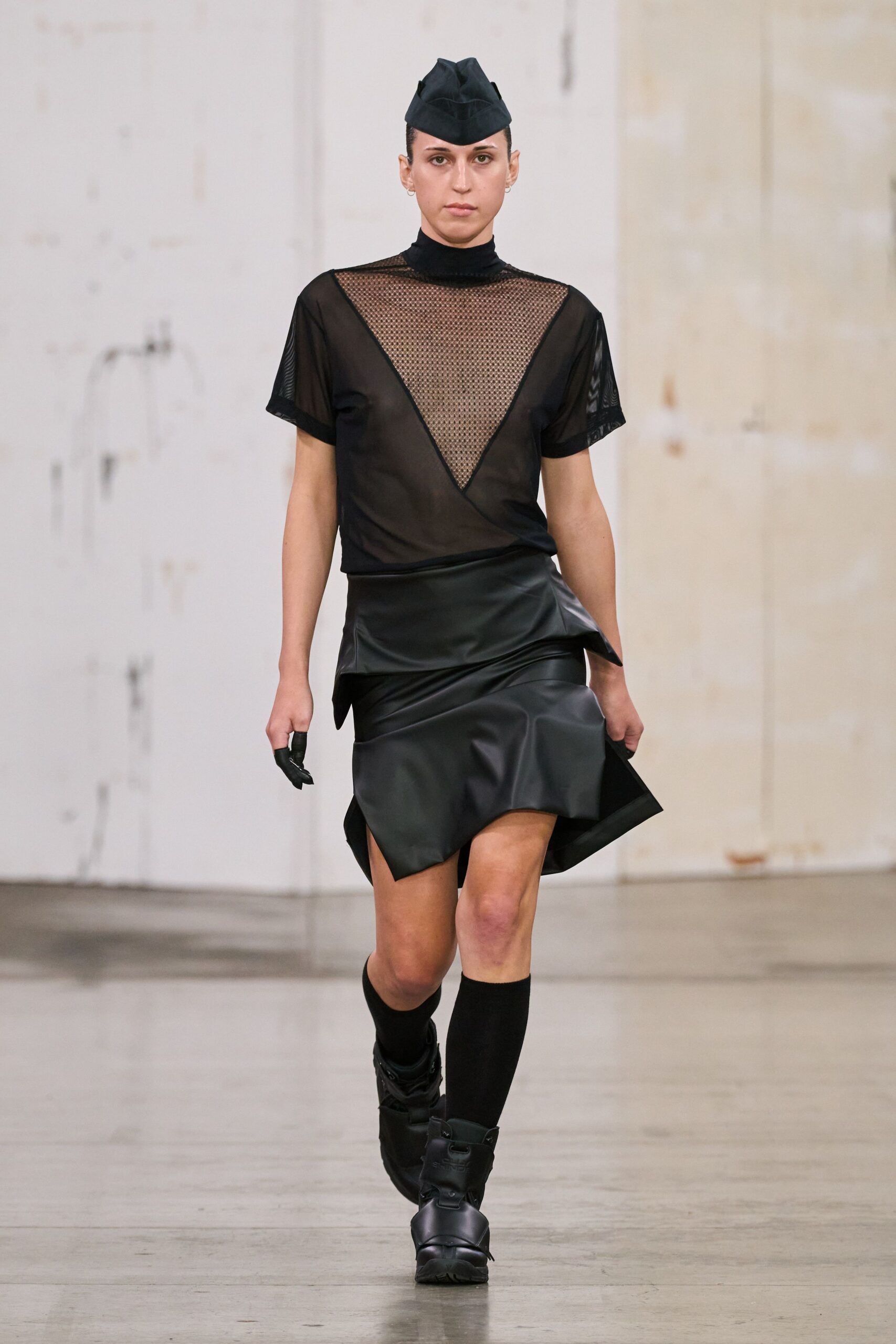 black mesh top and leather skirt