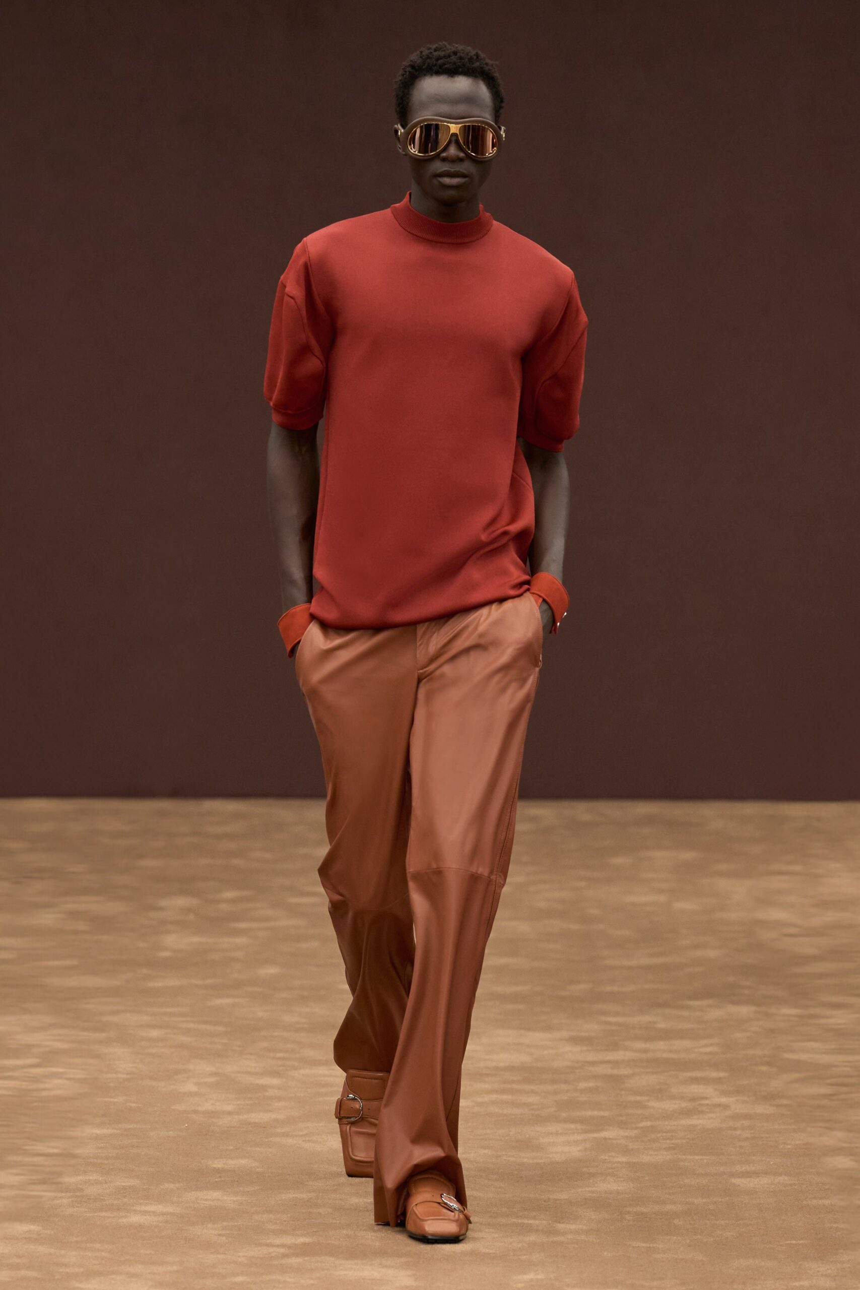 red relaxed top with orange pants