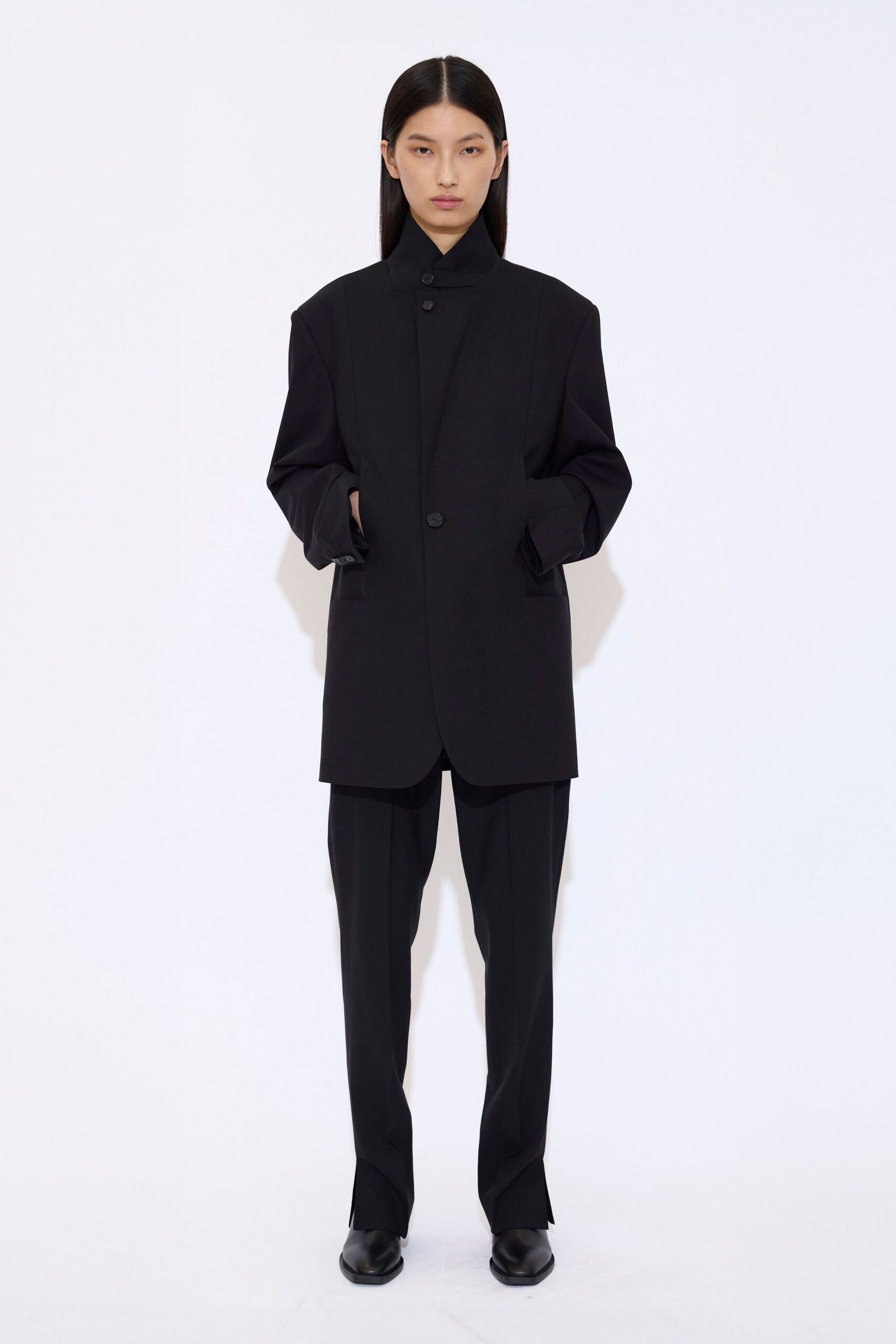 black oversized blazer with tailored pants
