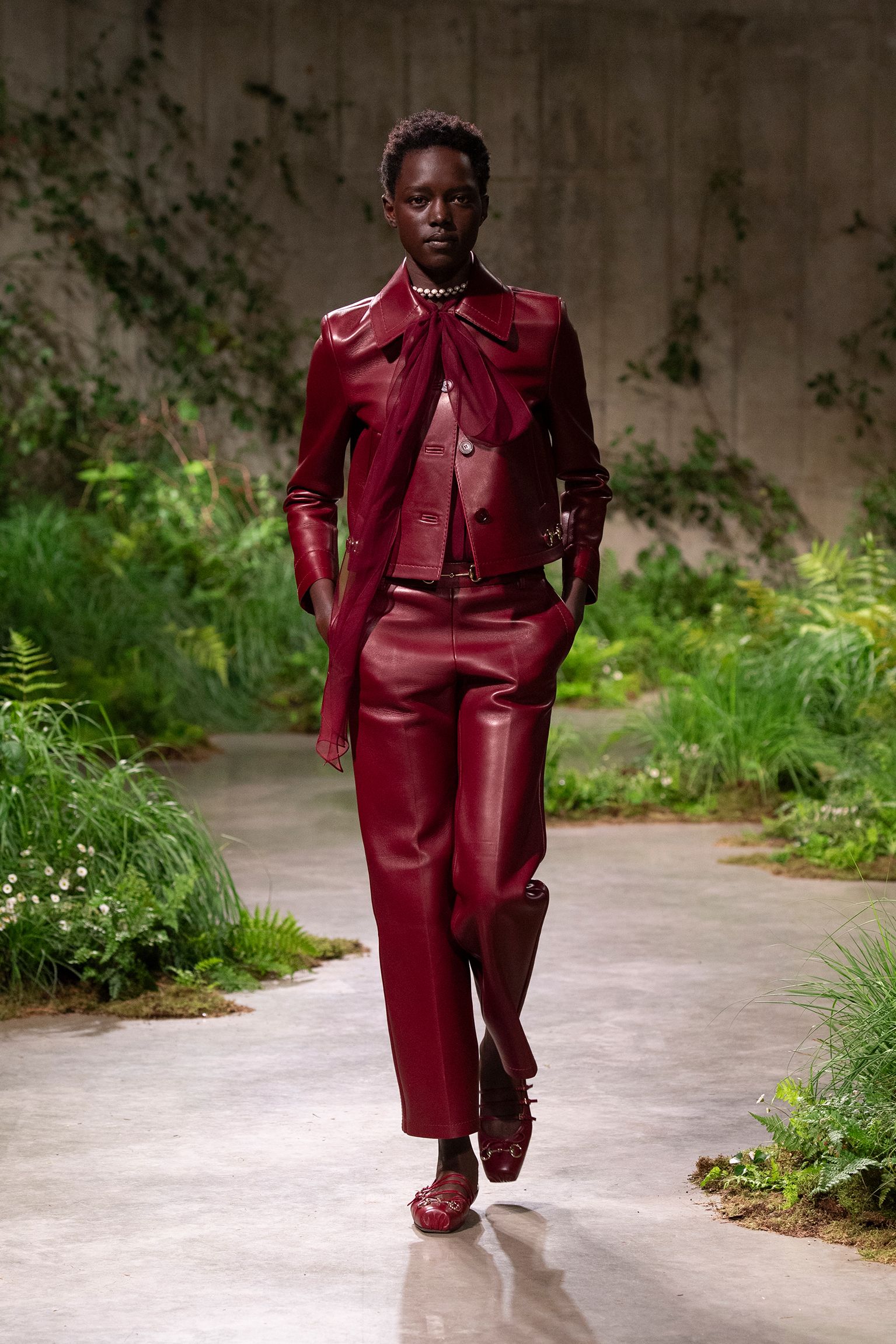red leather long-sleeve collared fitted zippered jacket
