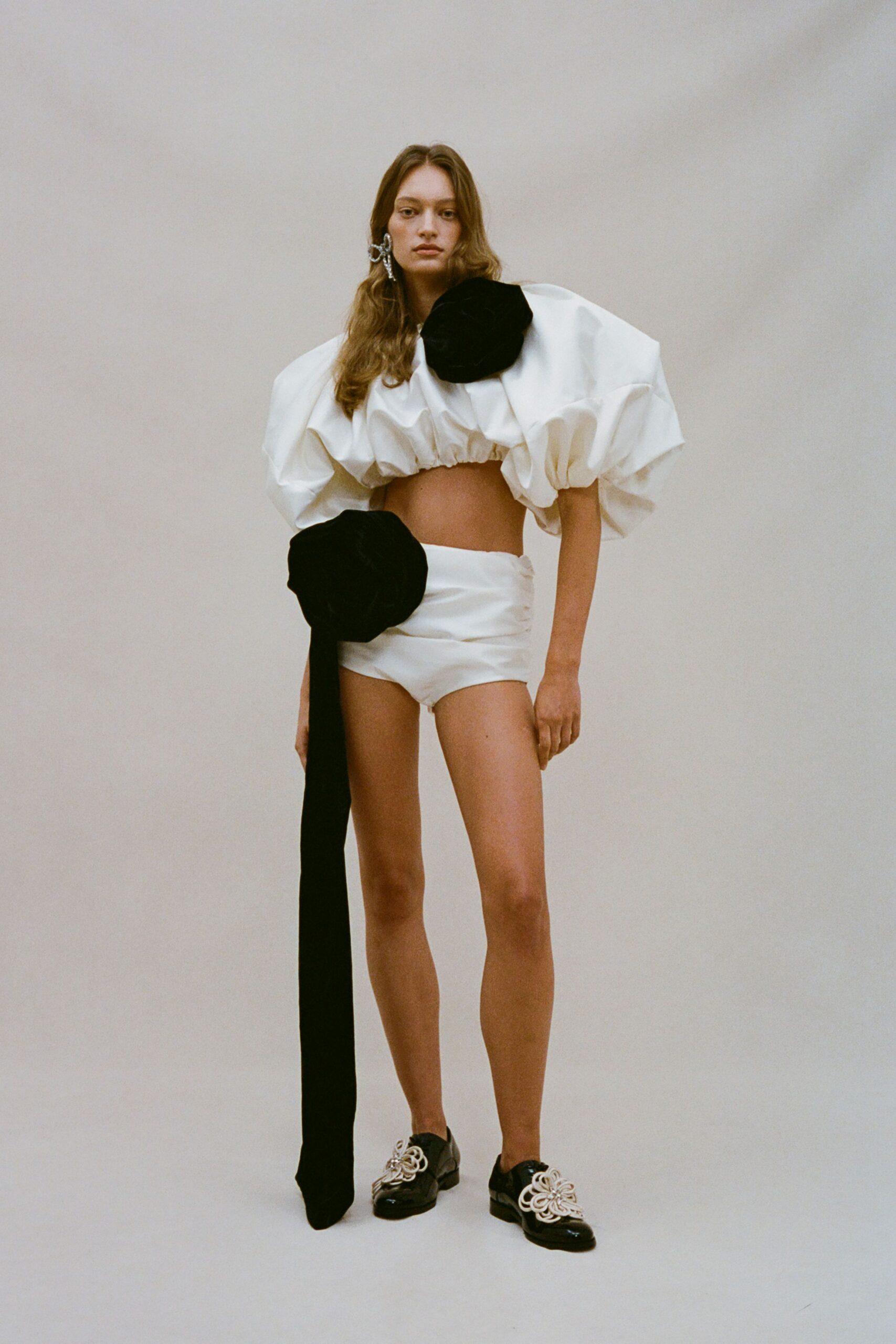 white ruffled top and shorts