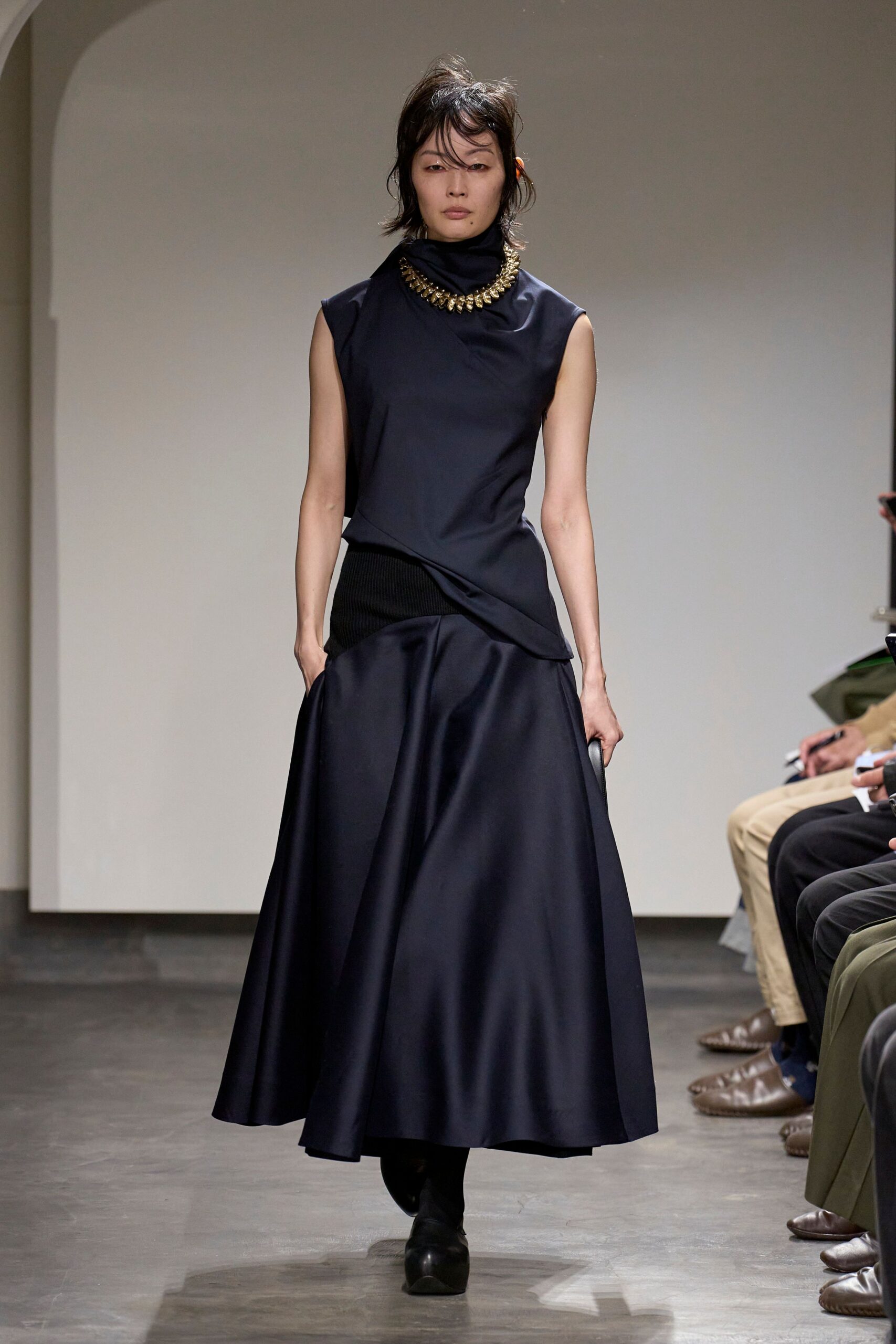 black silk sleeveless high-neck fitted draped top