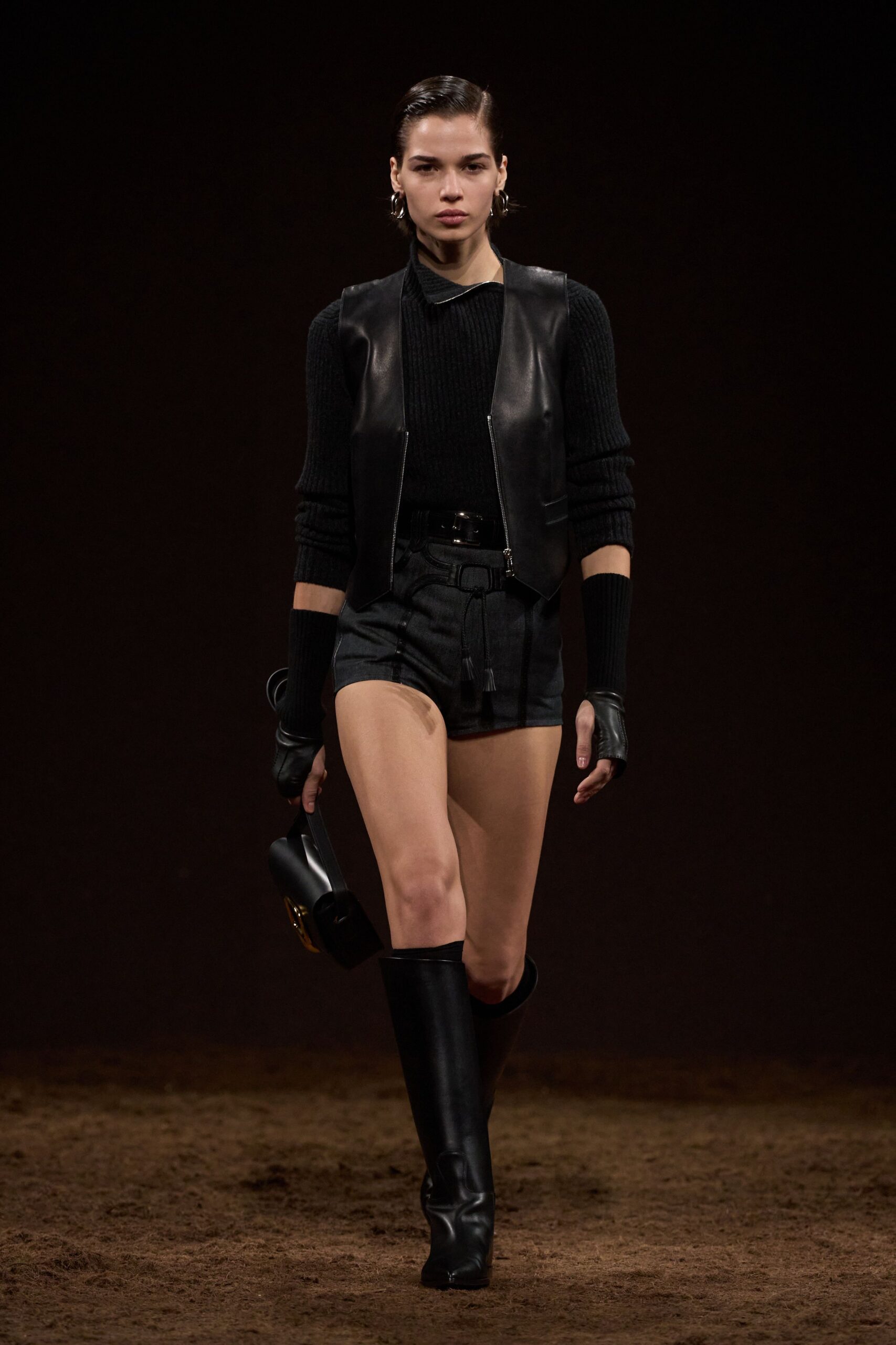 black leather vest and shorts