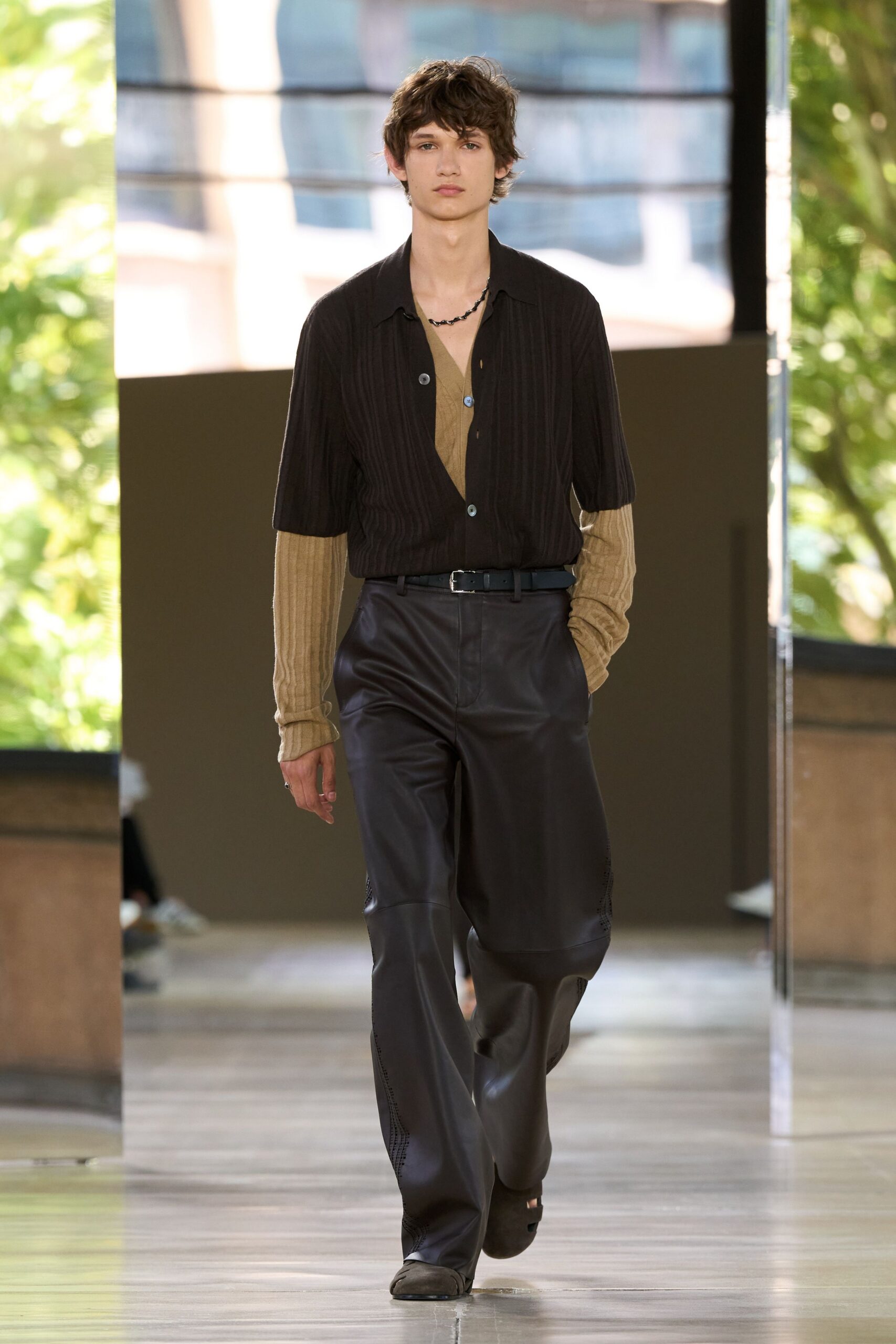 black and beige relaxed shirt with leather pants