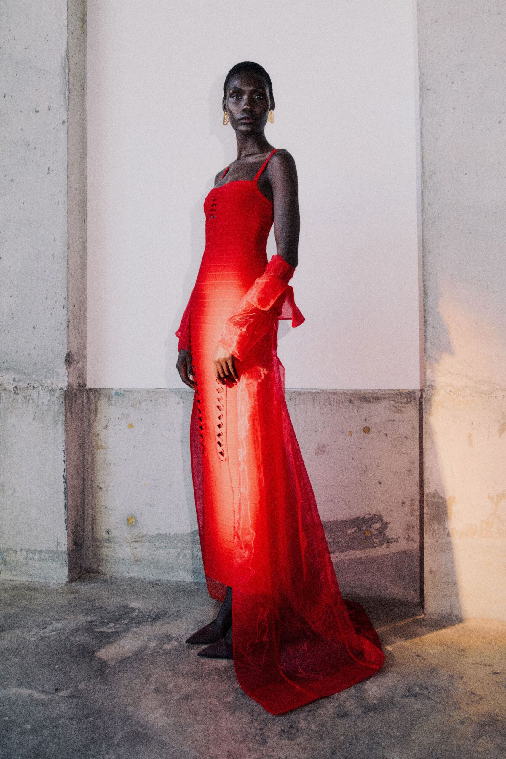 red silk sleeveless v-neck fitted ruched layered gown