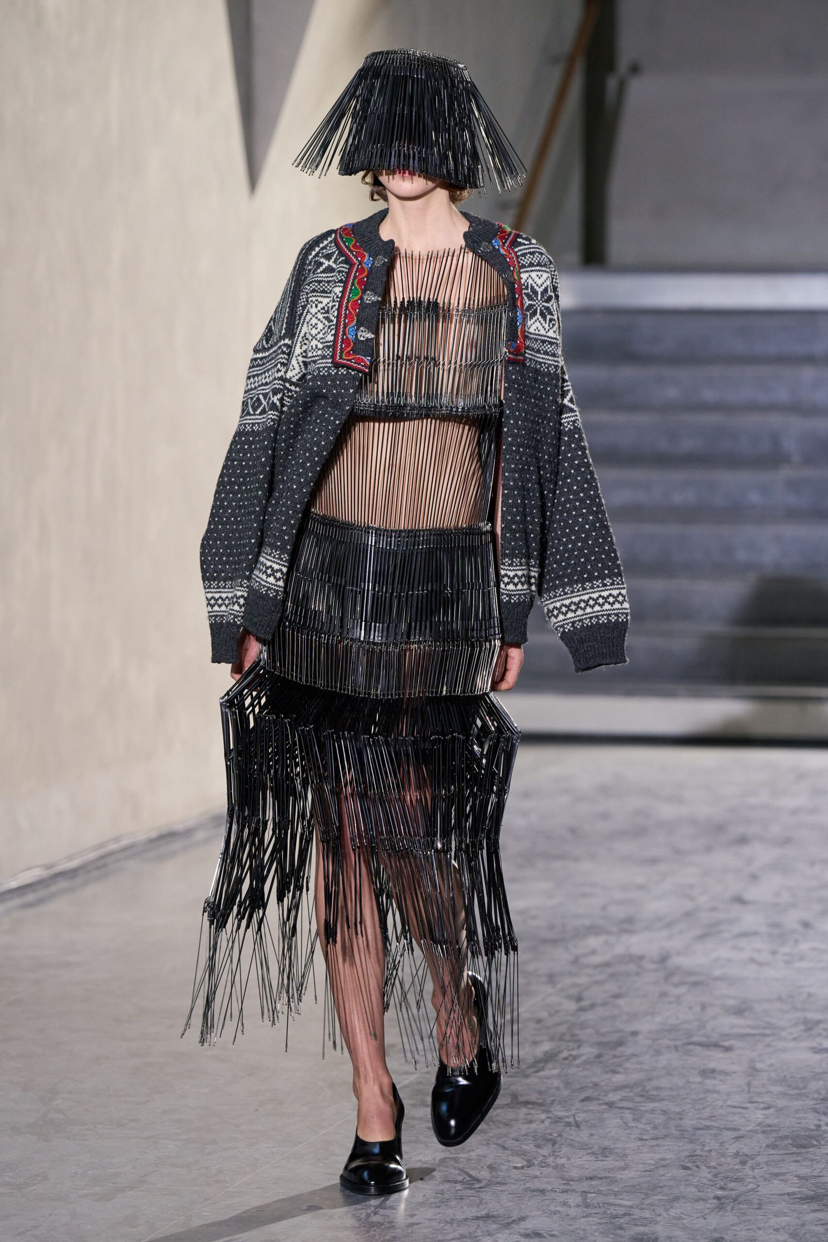 black fringed dress with oversized jacket