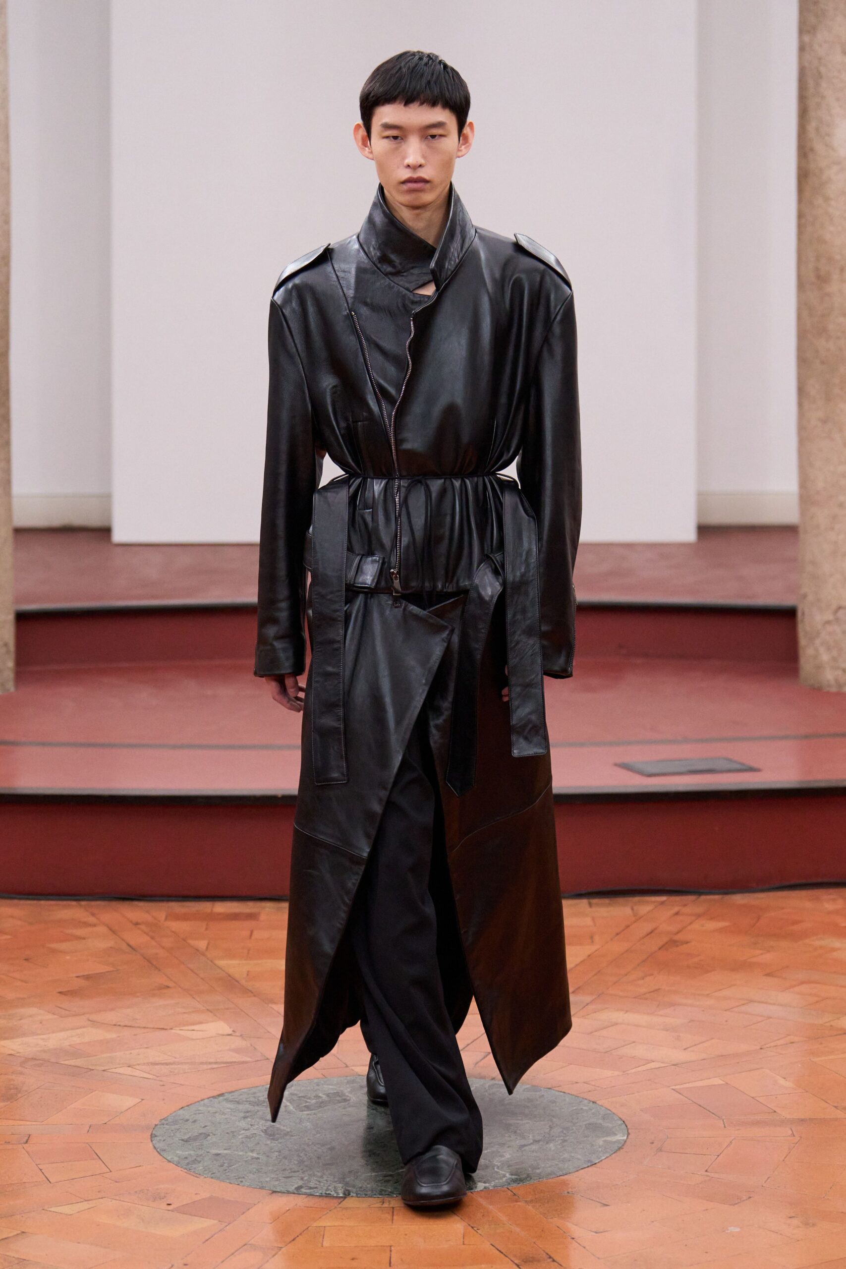 black leather belted coat