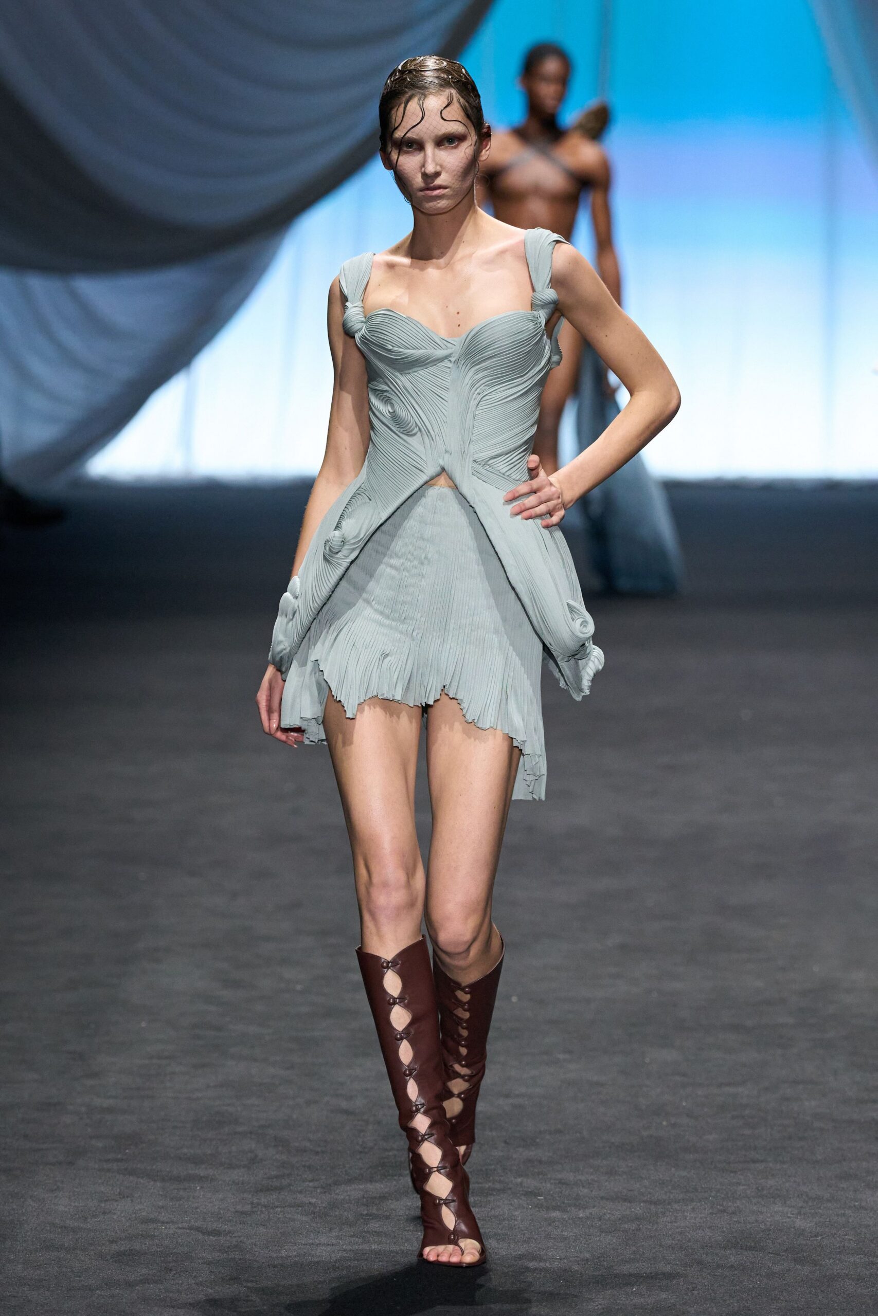 light blue pleated mini dress with brown boots
