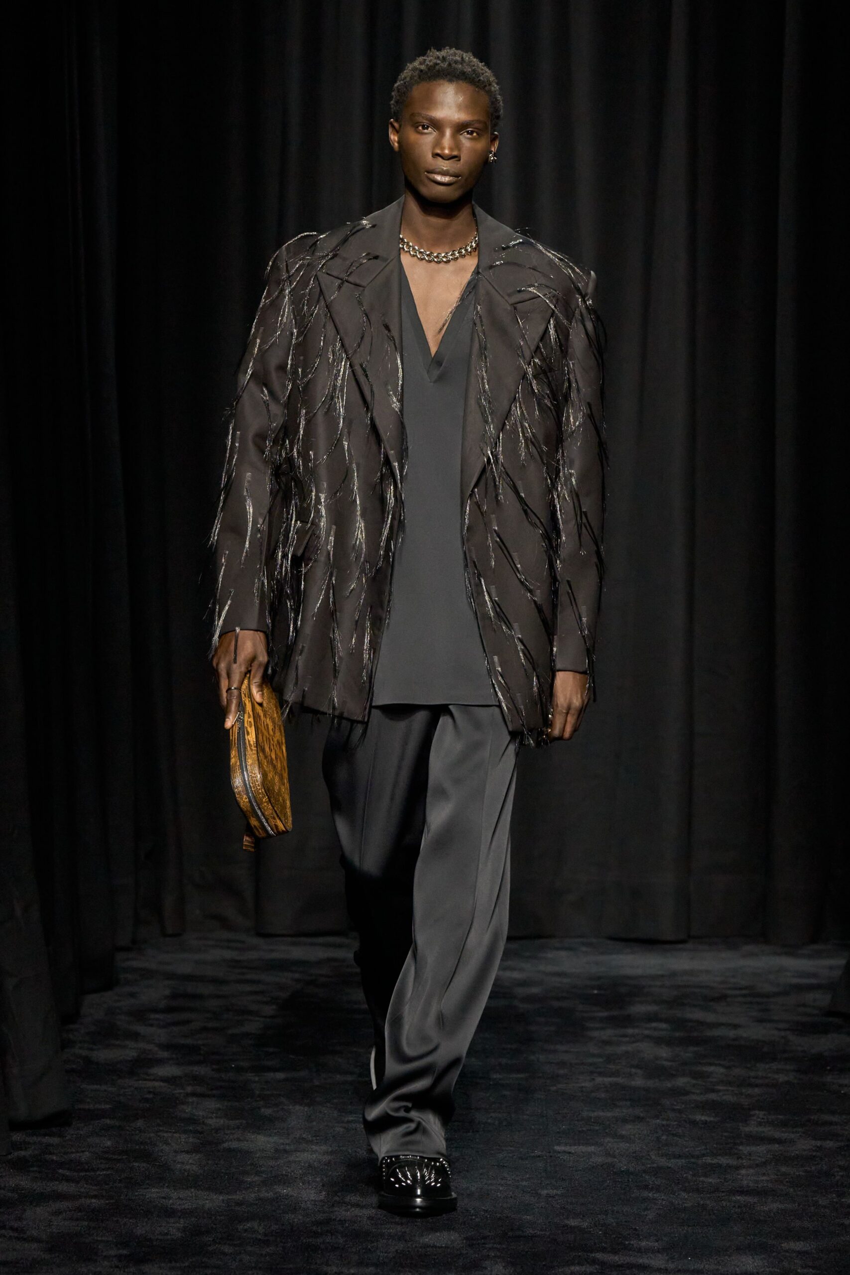 black relaxed blazer with silk shirt