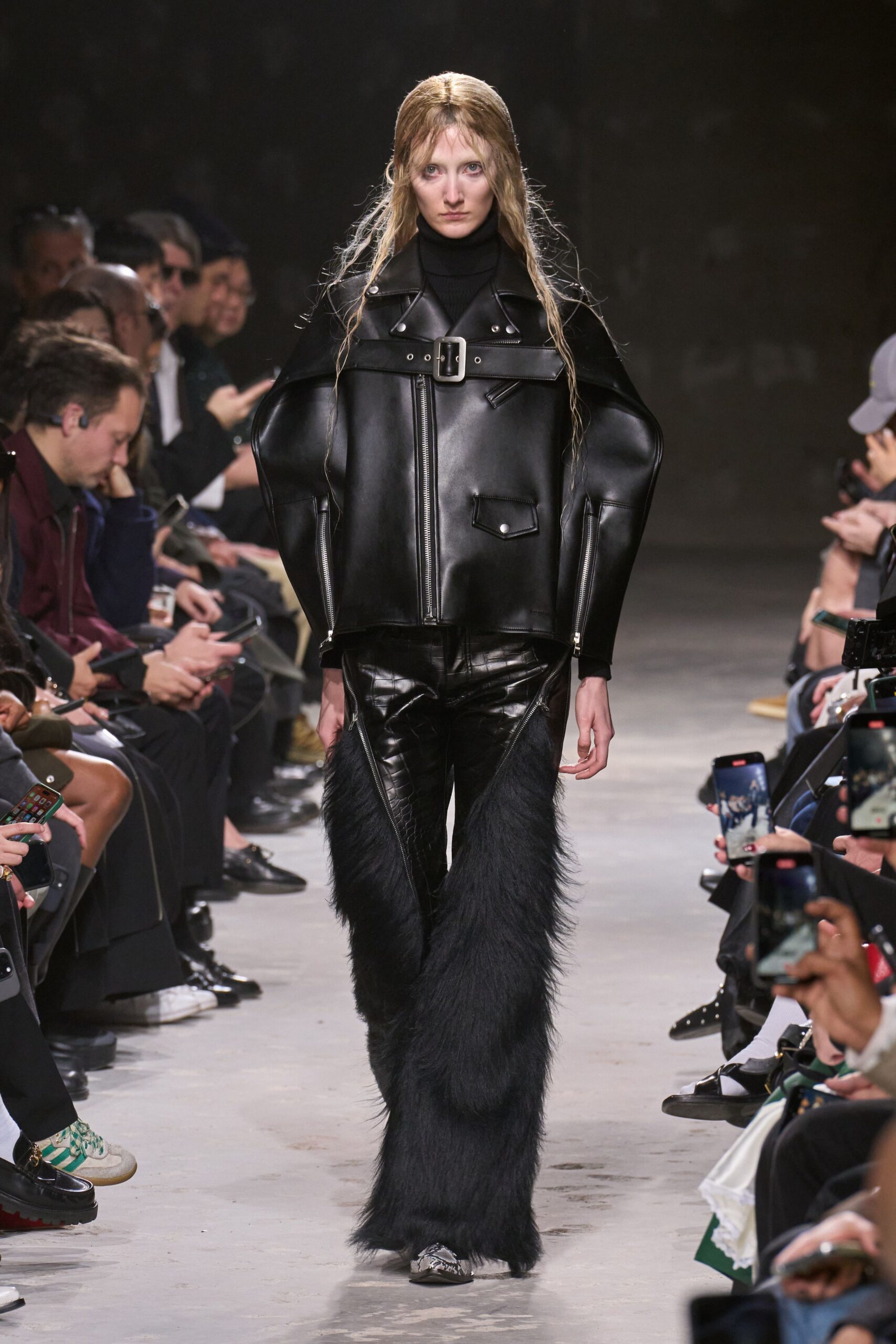 black leather structured jacket and flared pants