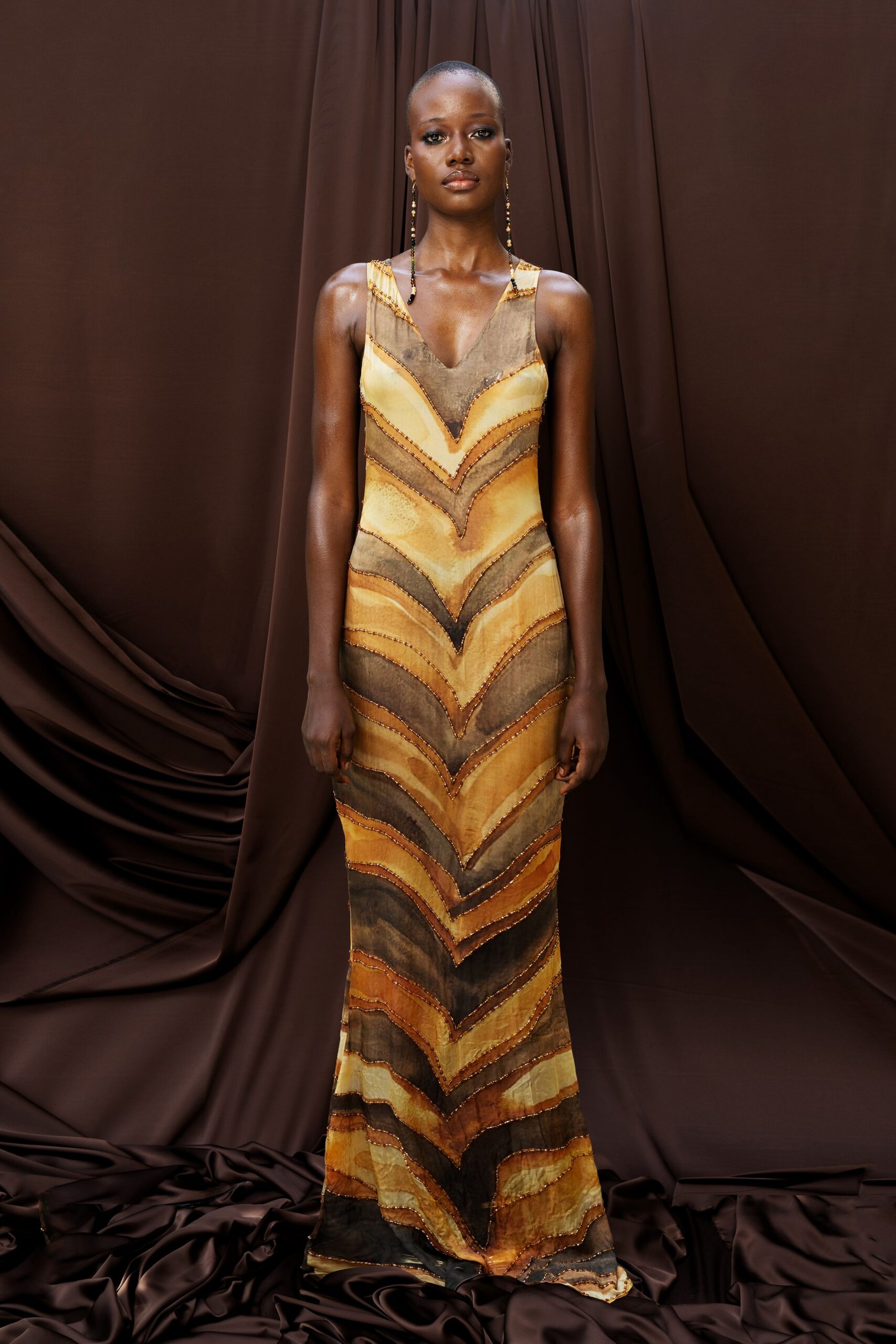 gold and brown fitted gown