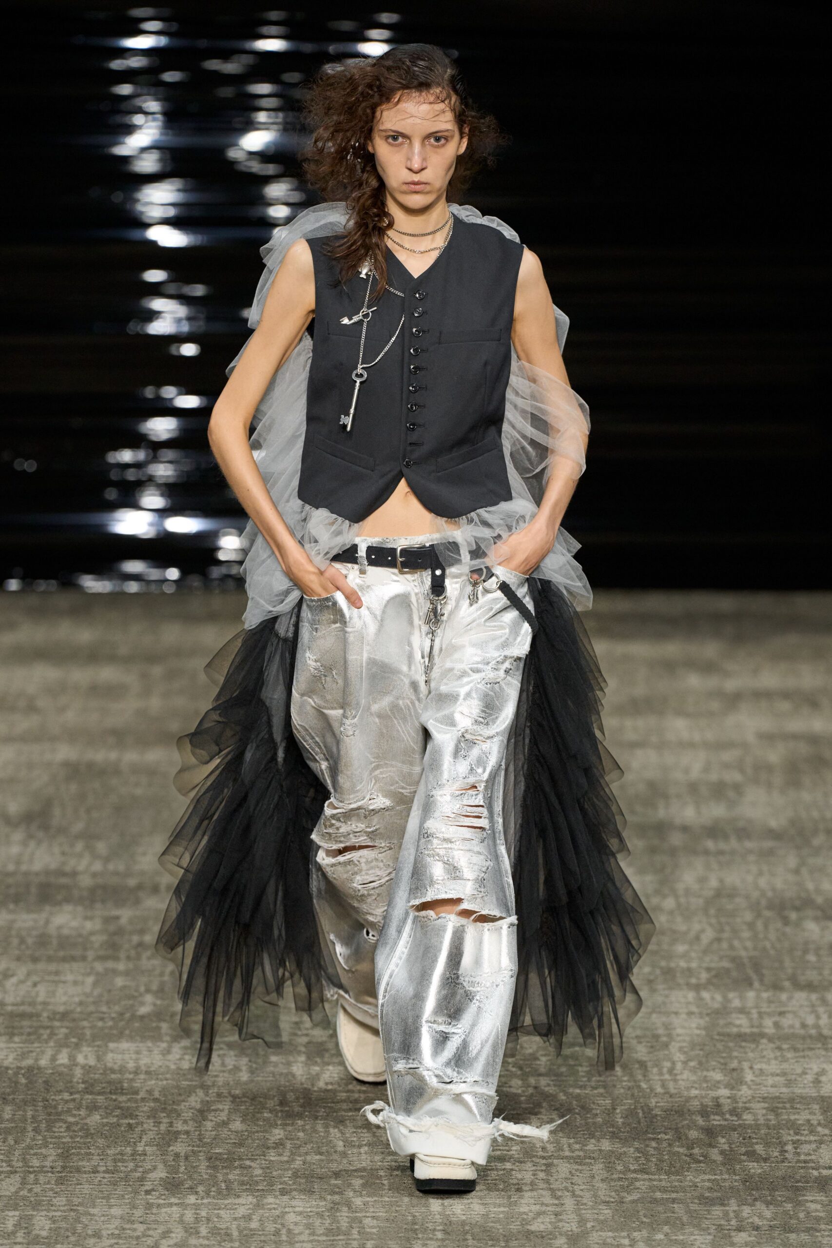 black sleeveless top silver pants