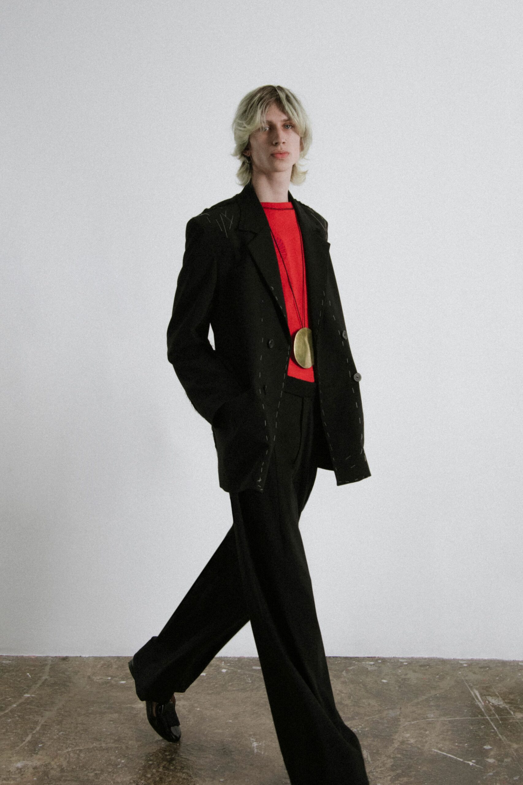 black blazer red top relaxed pants
