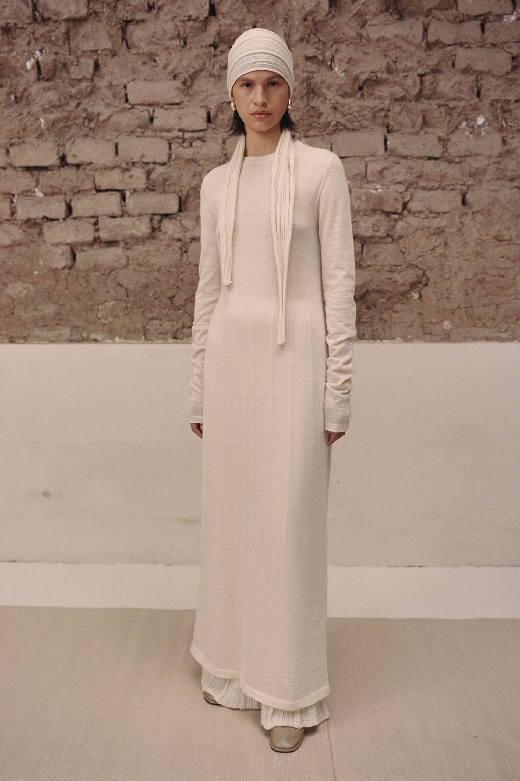 white cotton long-sleeve high-neck fitted layered maxi gown