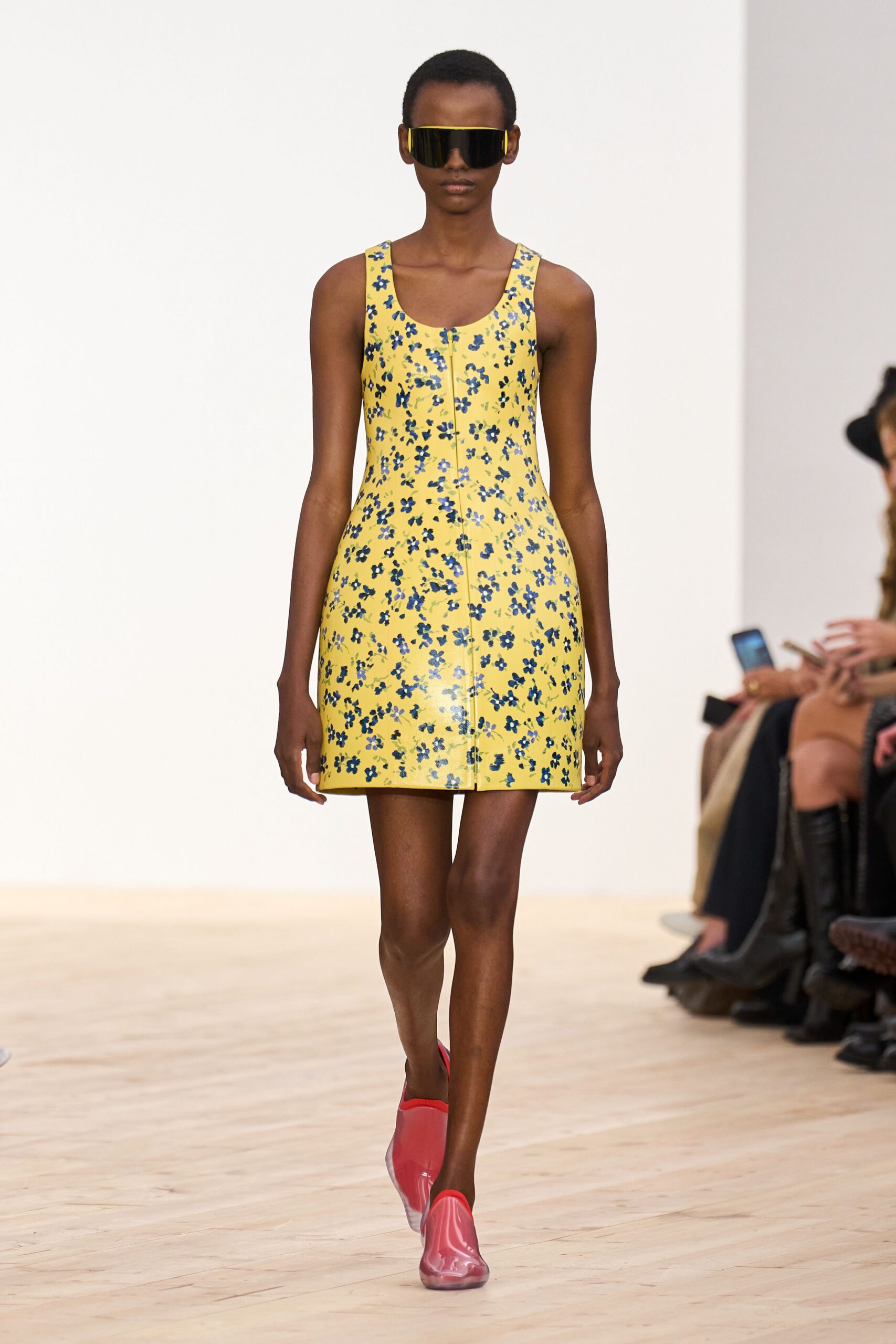 yellow floral mini-dress with red shoes
