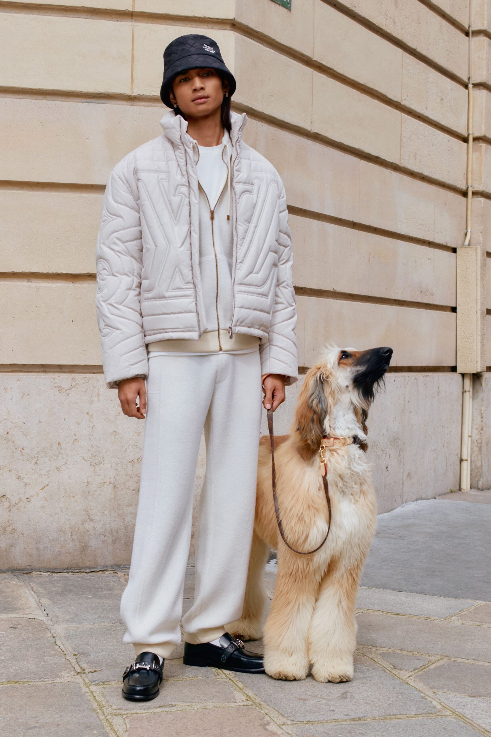 beige relaxed jacket with black hat