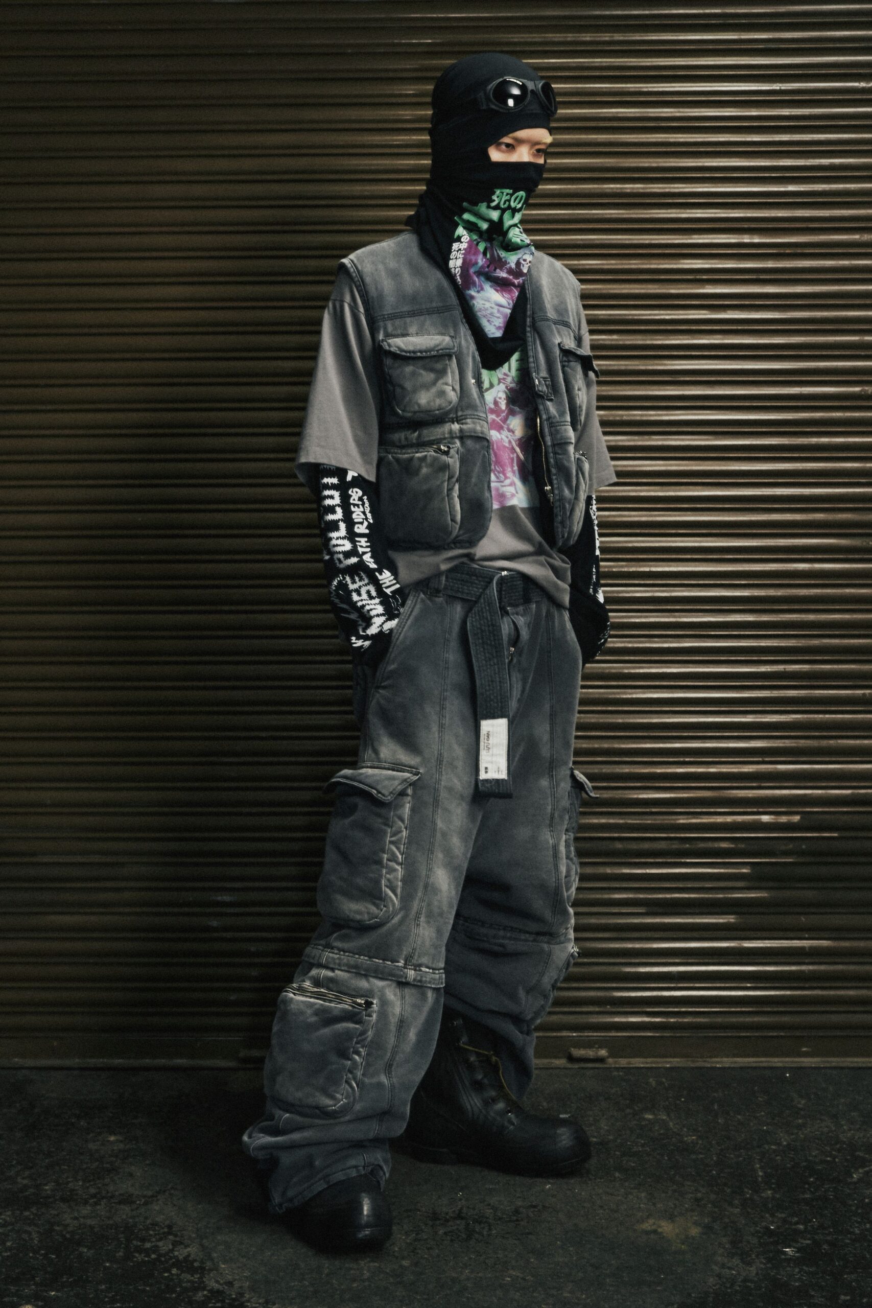 gray denim vest with relaxed pants