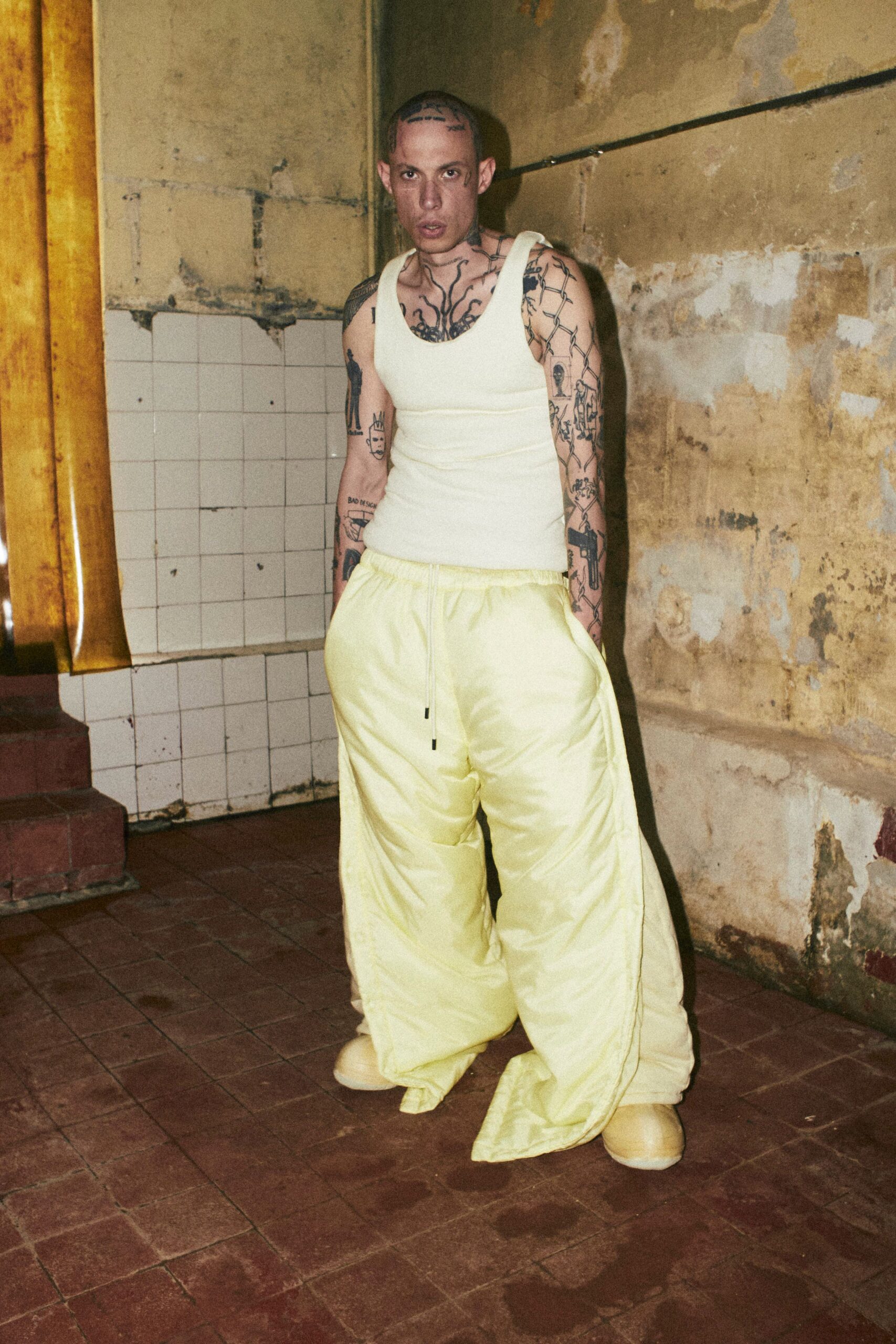 white tank-top yellow pants
